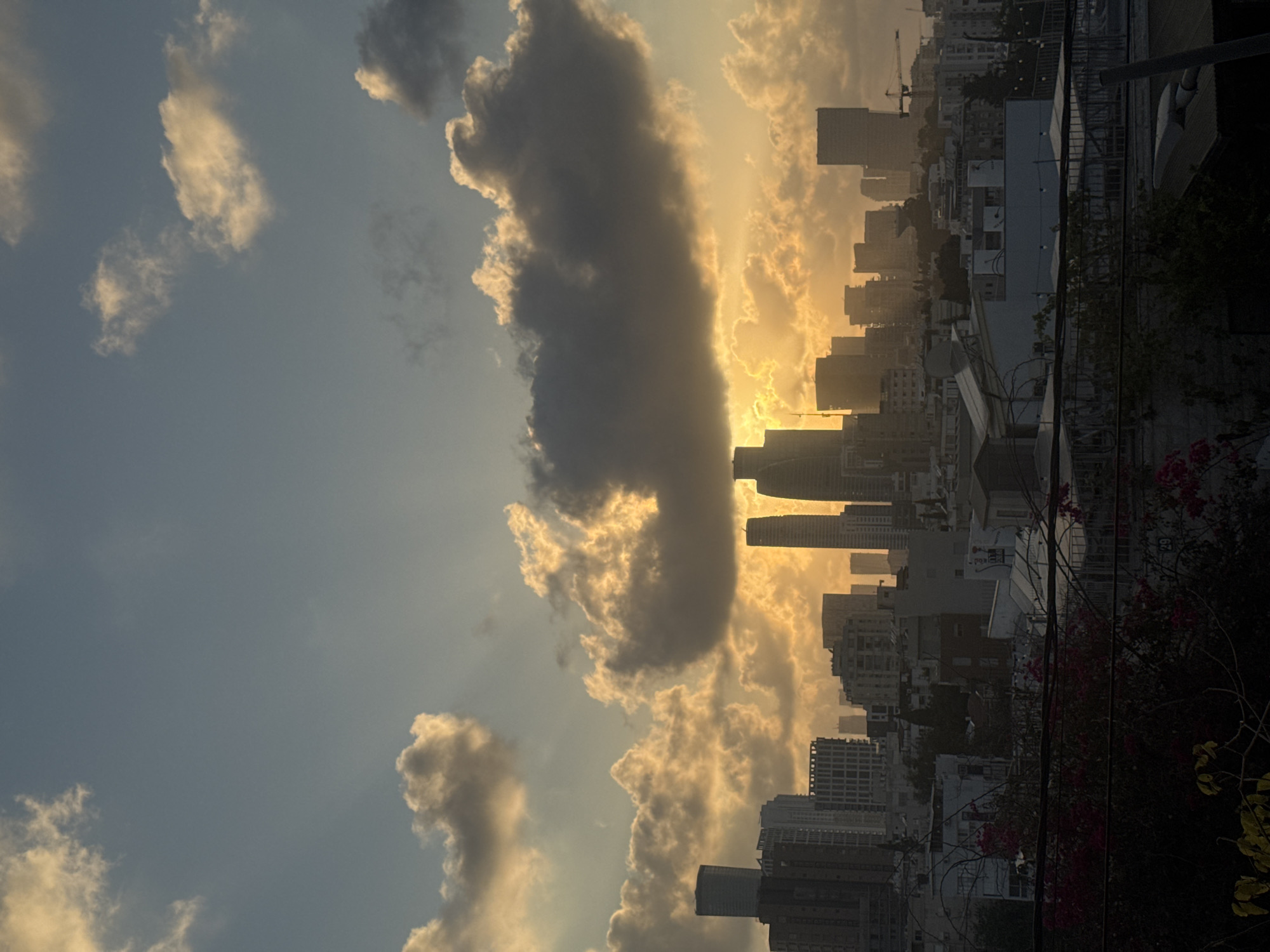 Golden-hour sunset views across Ramat Gan, with an outdoor event setting up