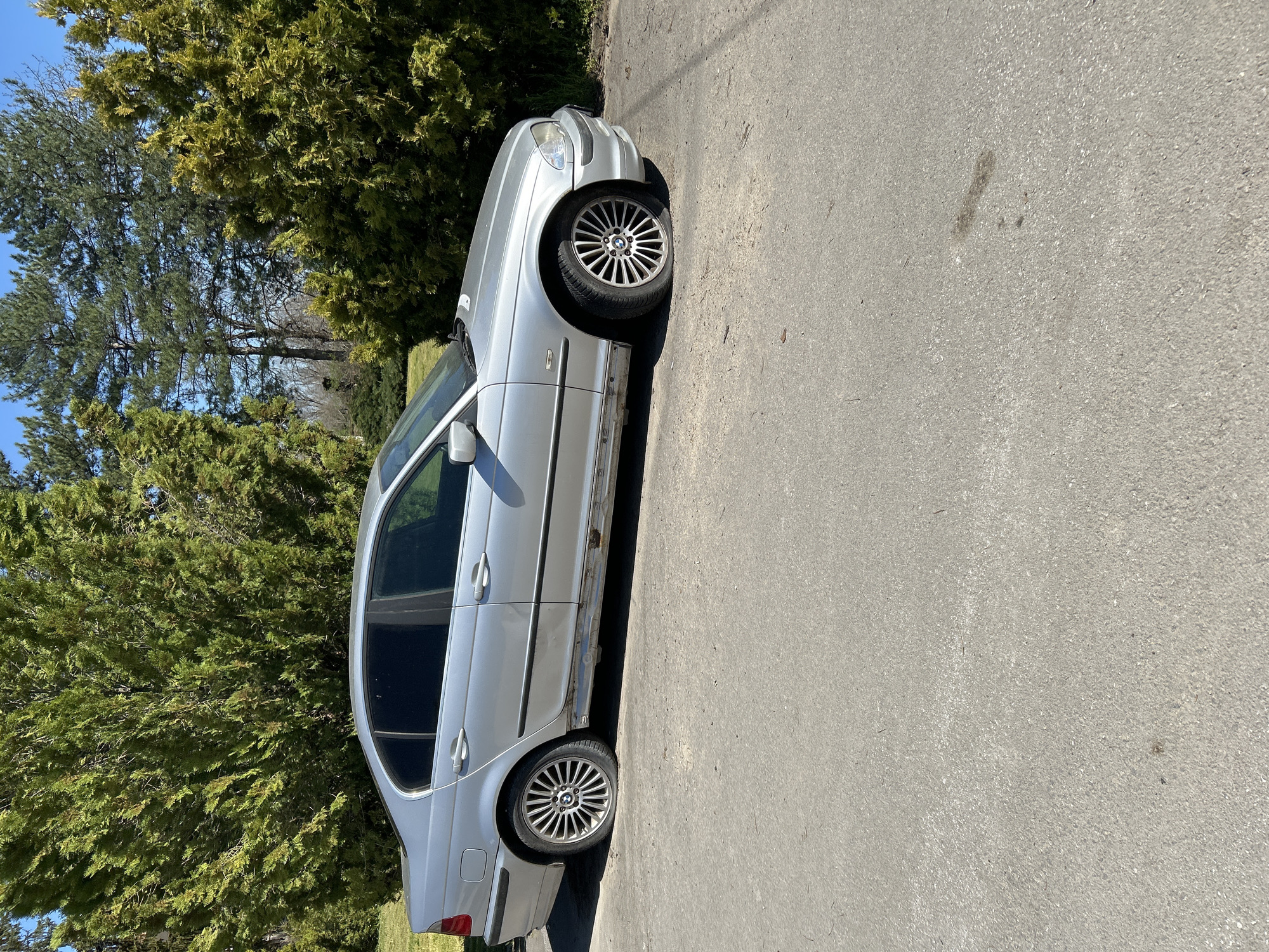 Worn BMW sedan spotted parked in Dichin, Bulgaria