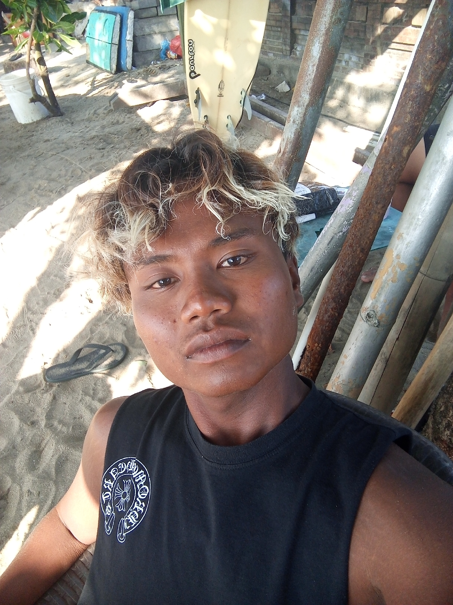 Kuta Beach morning: surf, vendors, and everyday beach life