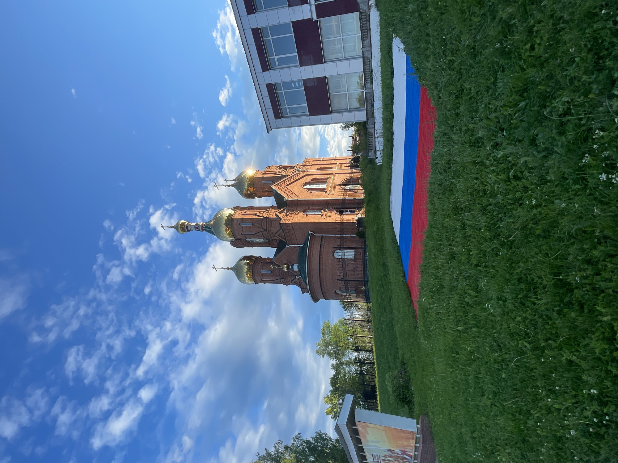 Afternoon scenes captured in Krasnye Baki featuring Orthodox church