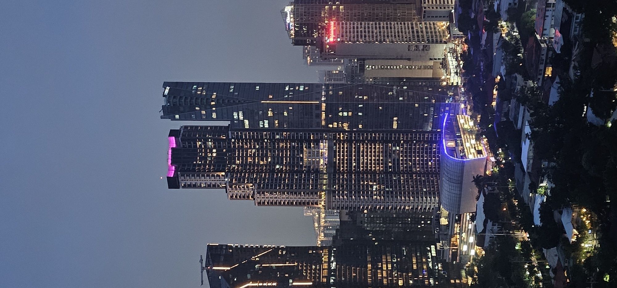 Makati at night: skyline, traffic, and Ayala Malls Circuit