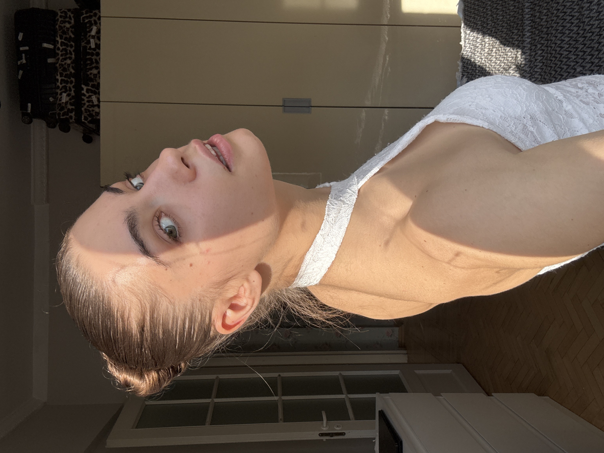 Woman in white lace top observed in Moscow residence