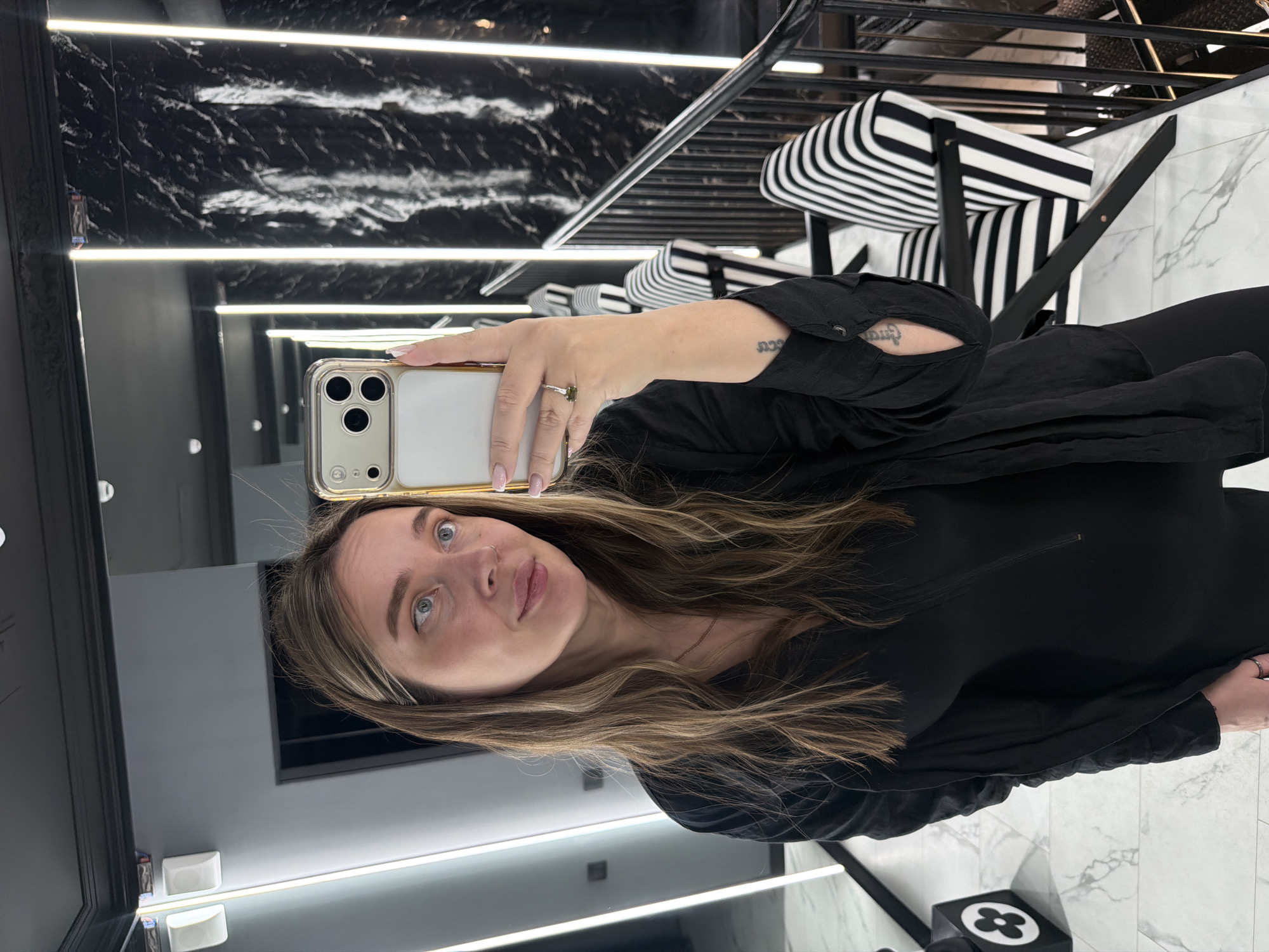 Woman takes mirror selfie in Moscow apartment