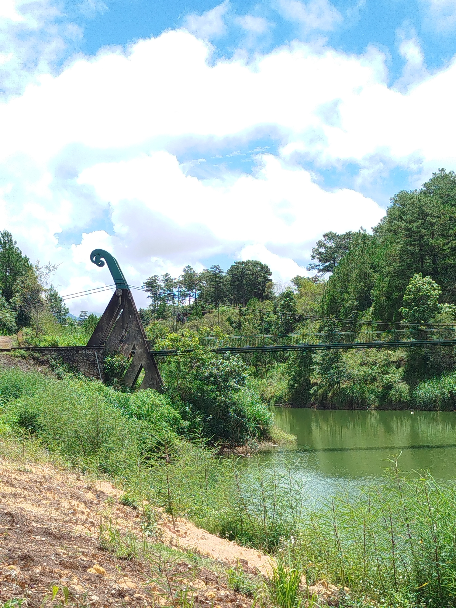 Exploring suspension bridges, lakes, and hillside facilities near Lang Biang