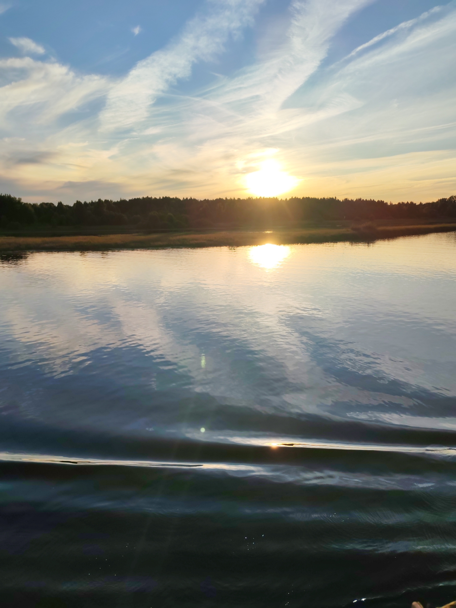 Sunset transit along the Sheksna River, Russia