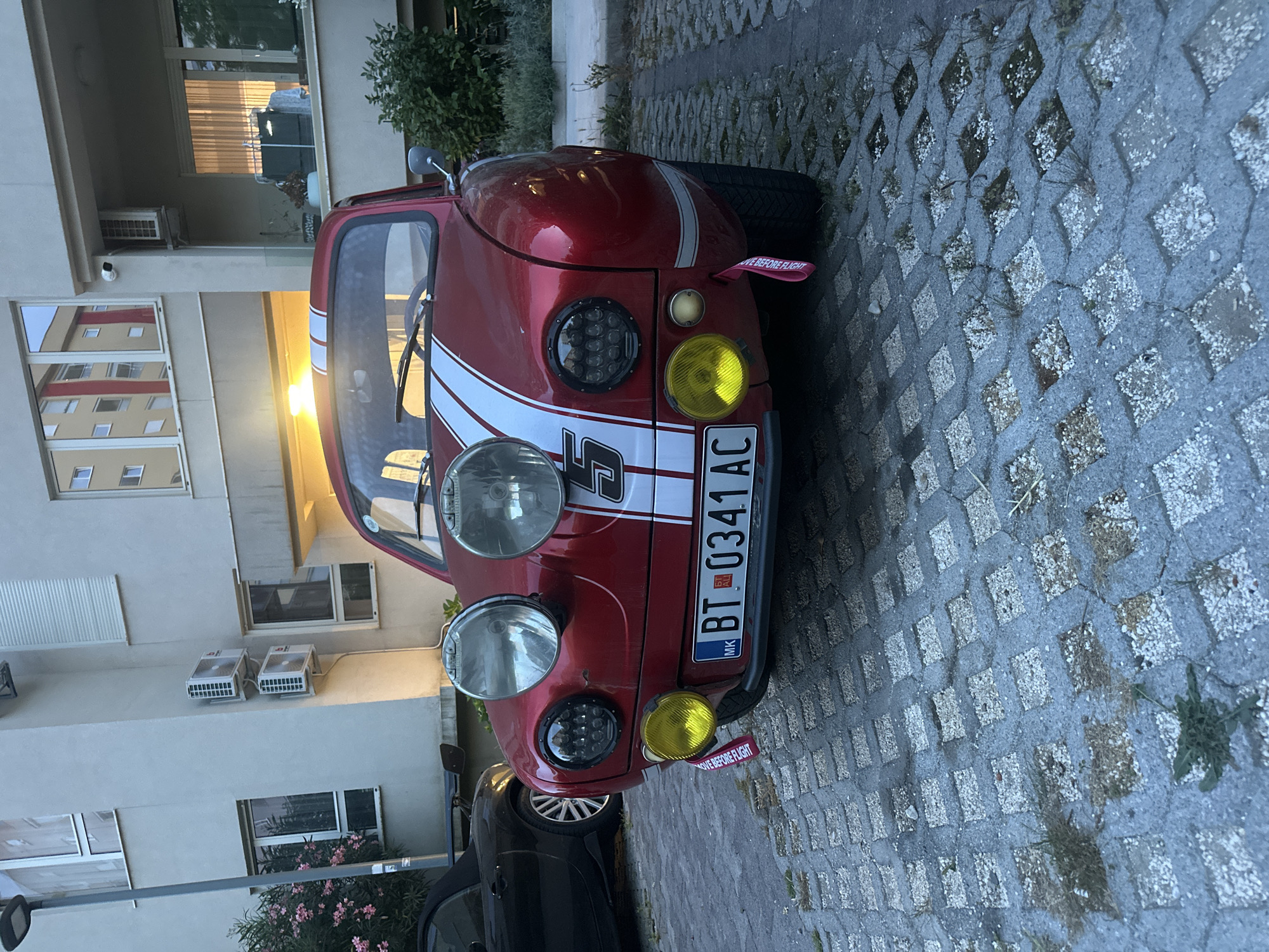 Afternoon documentation captures cars, dining, flowers in Boreti, Montenegro