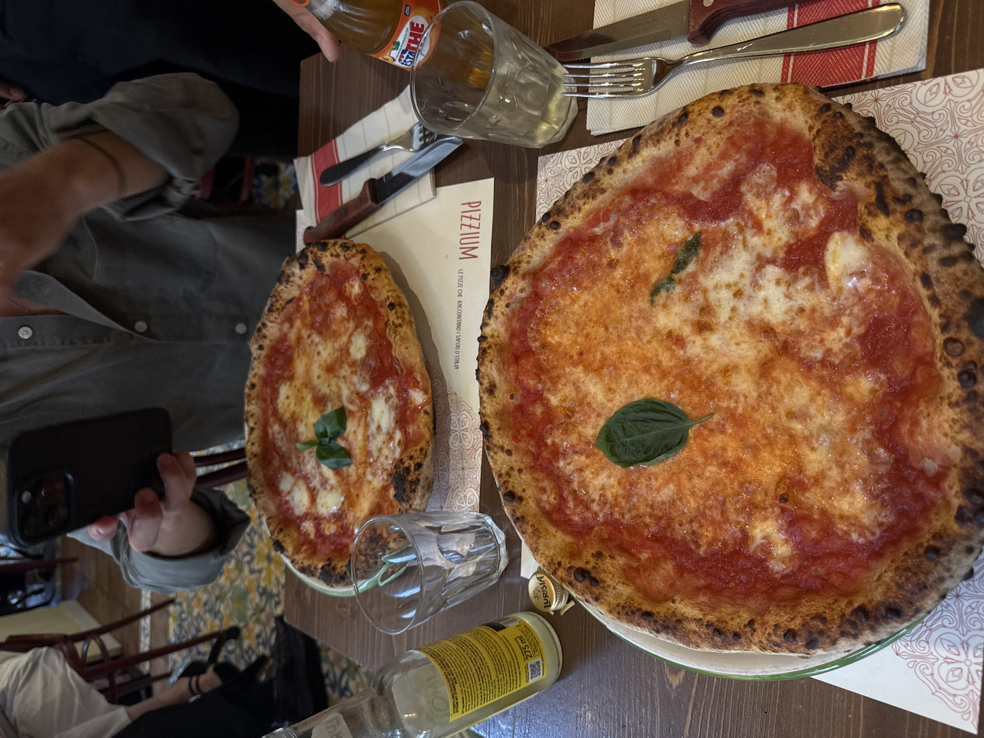 Neapolitan pizzas on the table at Pizzium, Milan
