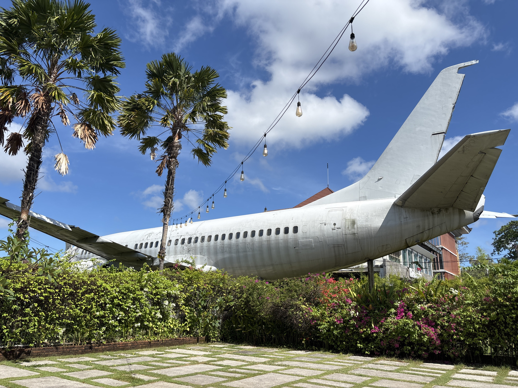 Repurposed airplane attraction documented in Kuta, Indonesia