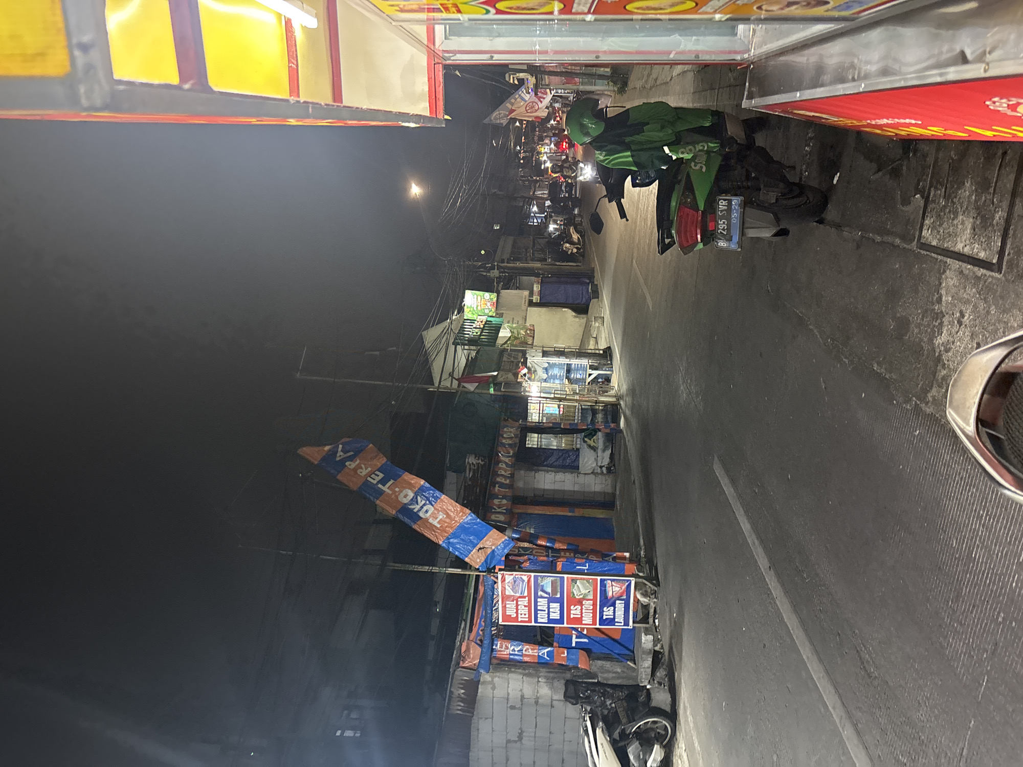 North Jakarta street night: Arabian Kebab stall and sidewalk scene