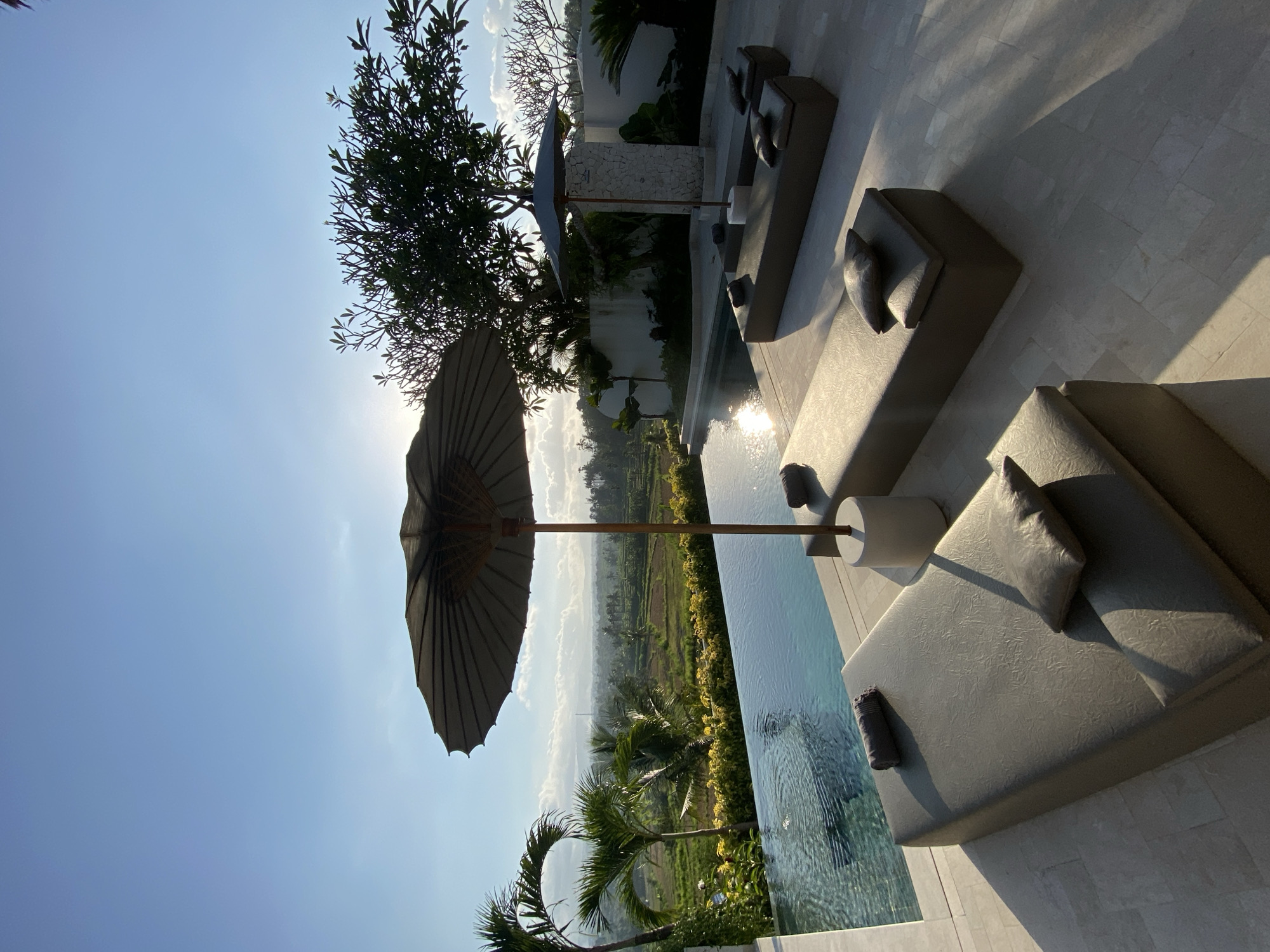 Inside and outside a lush tropical villa or resort