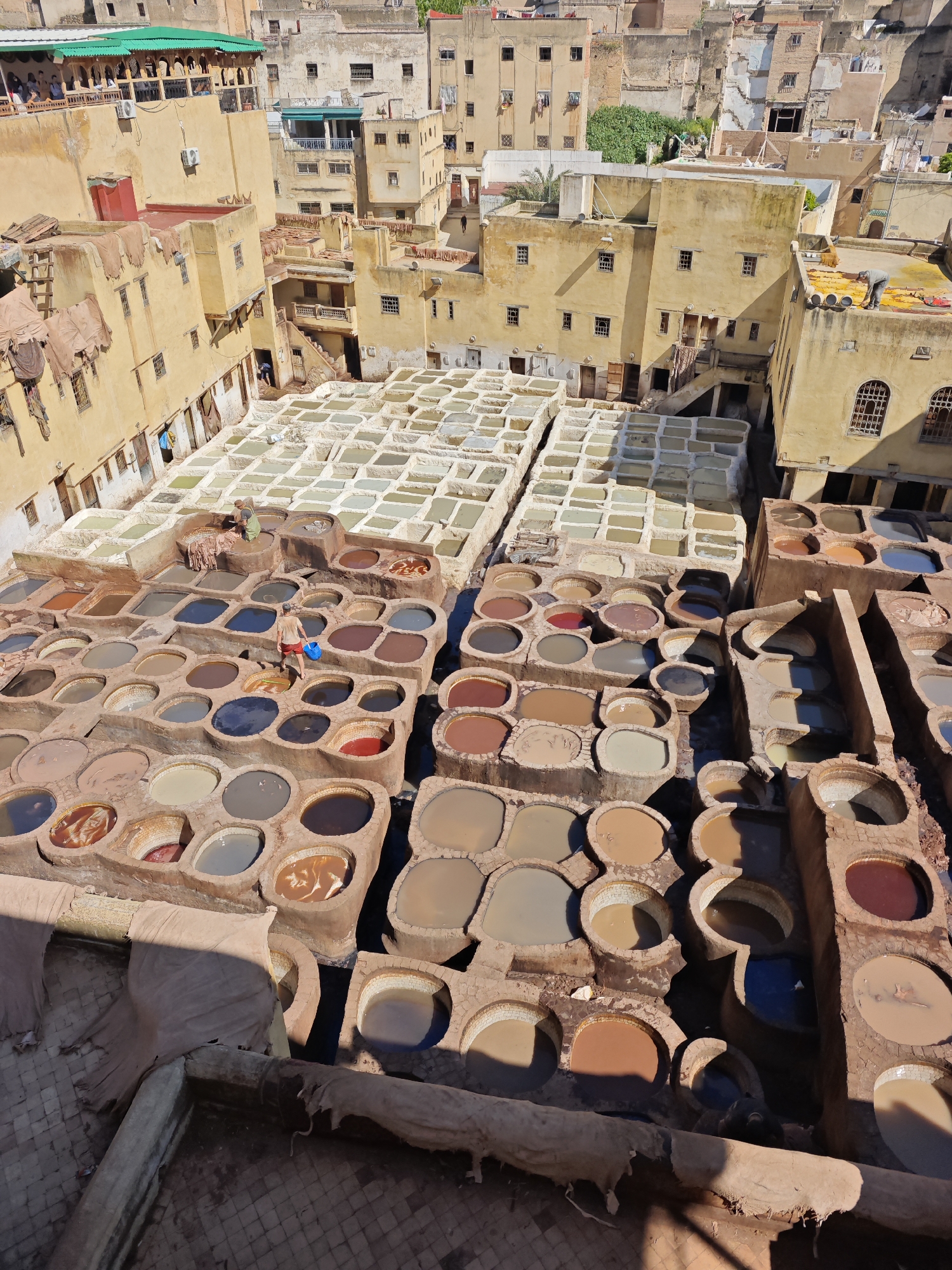 Traditional leather workers operate historic Chouara tanneries in Fez