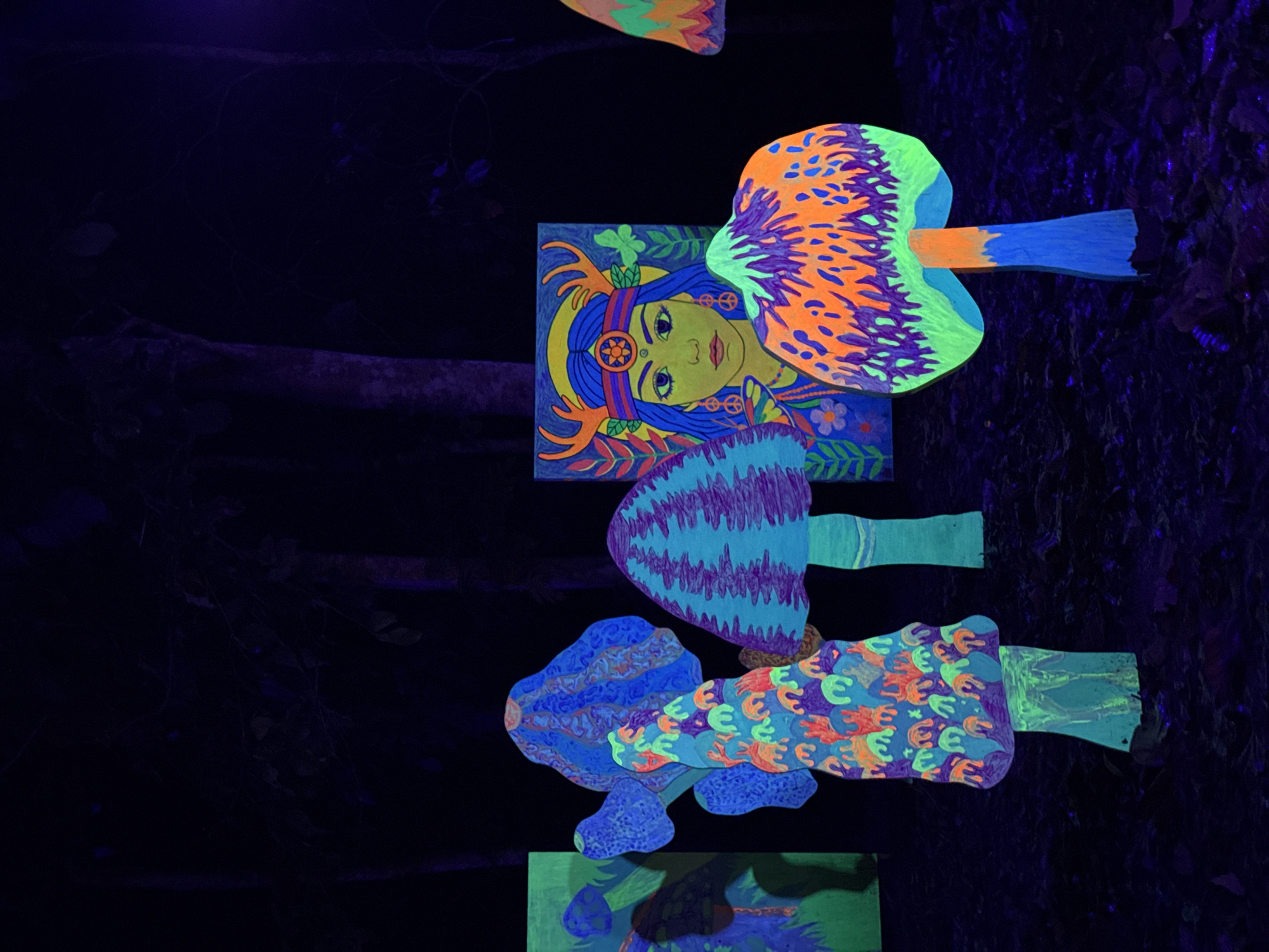 Surreal illuminated sculpture park at night in Ko Samui