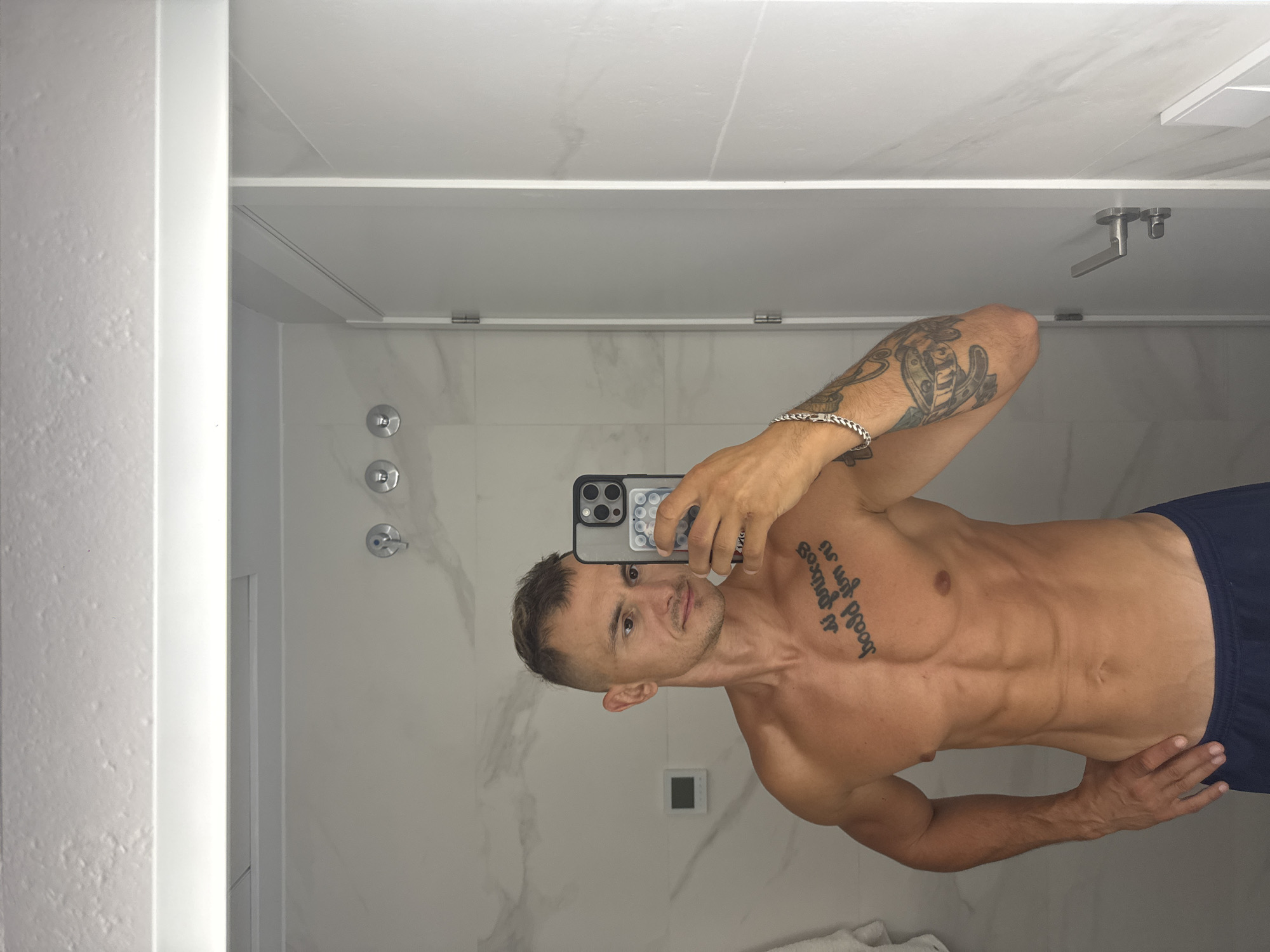 Morning bathroom routine in Finestrat, tattoos and all