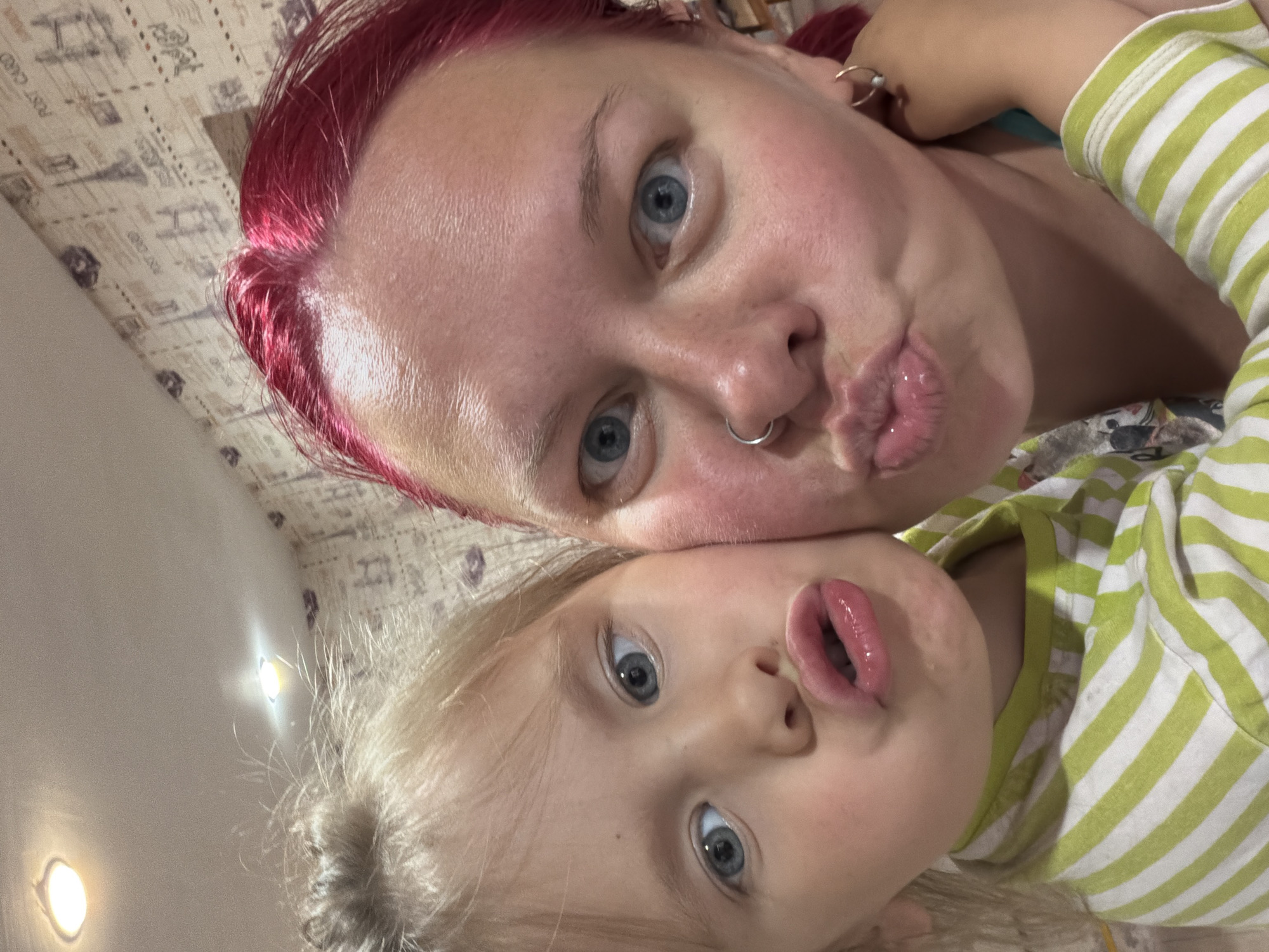 Indoor moments: selfie and cat feeding captured same location