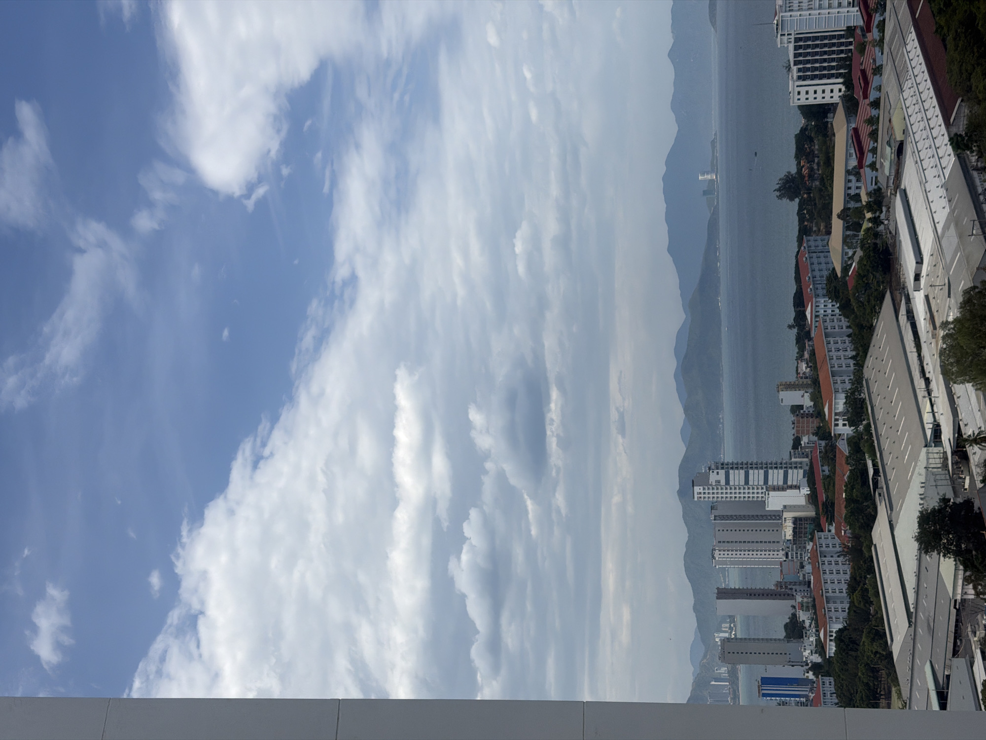 High-rise morning in Nha Trang, coast views and elevator moments