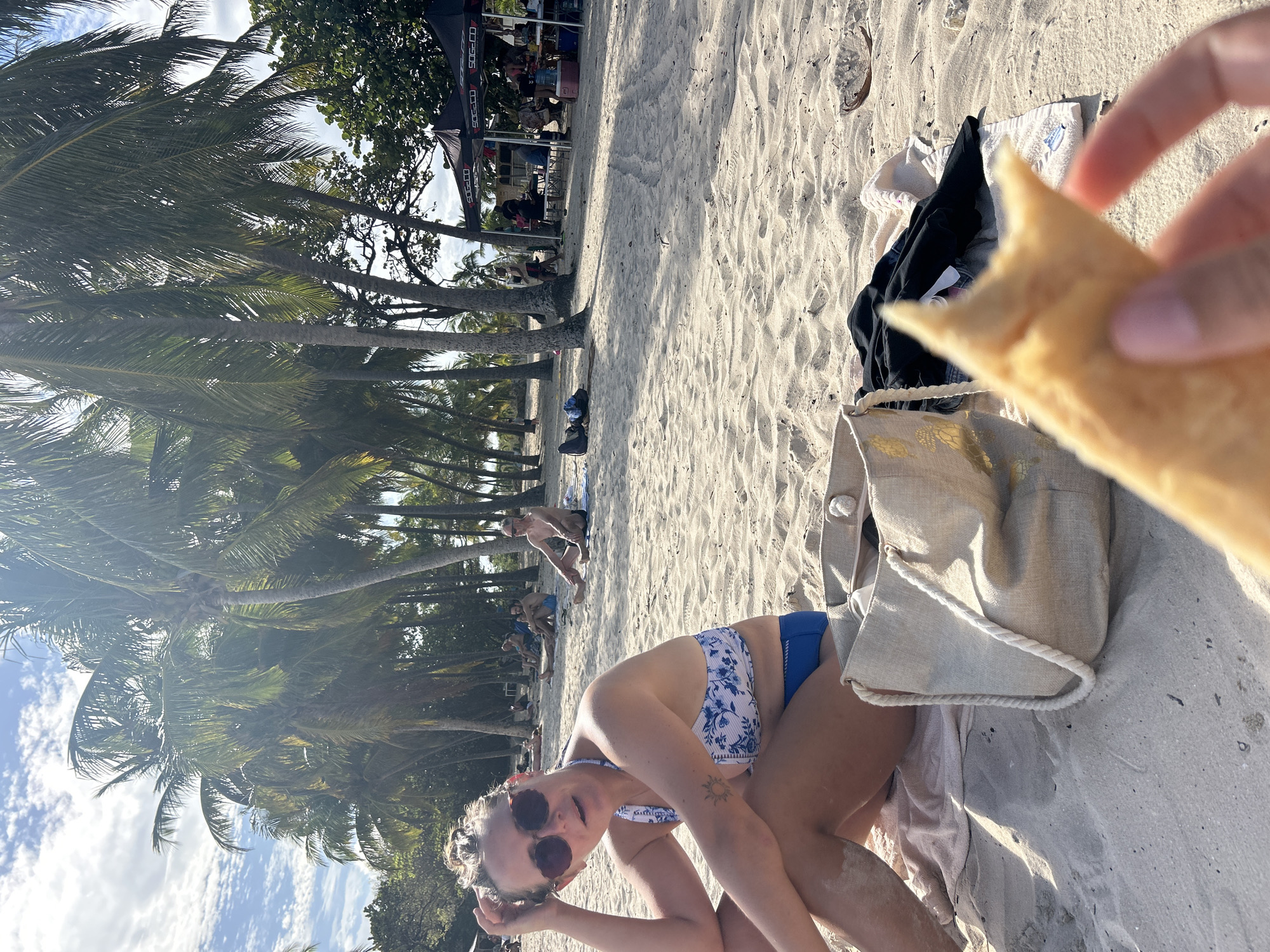Woman enjoys beach time in Sainte-Anne, France