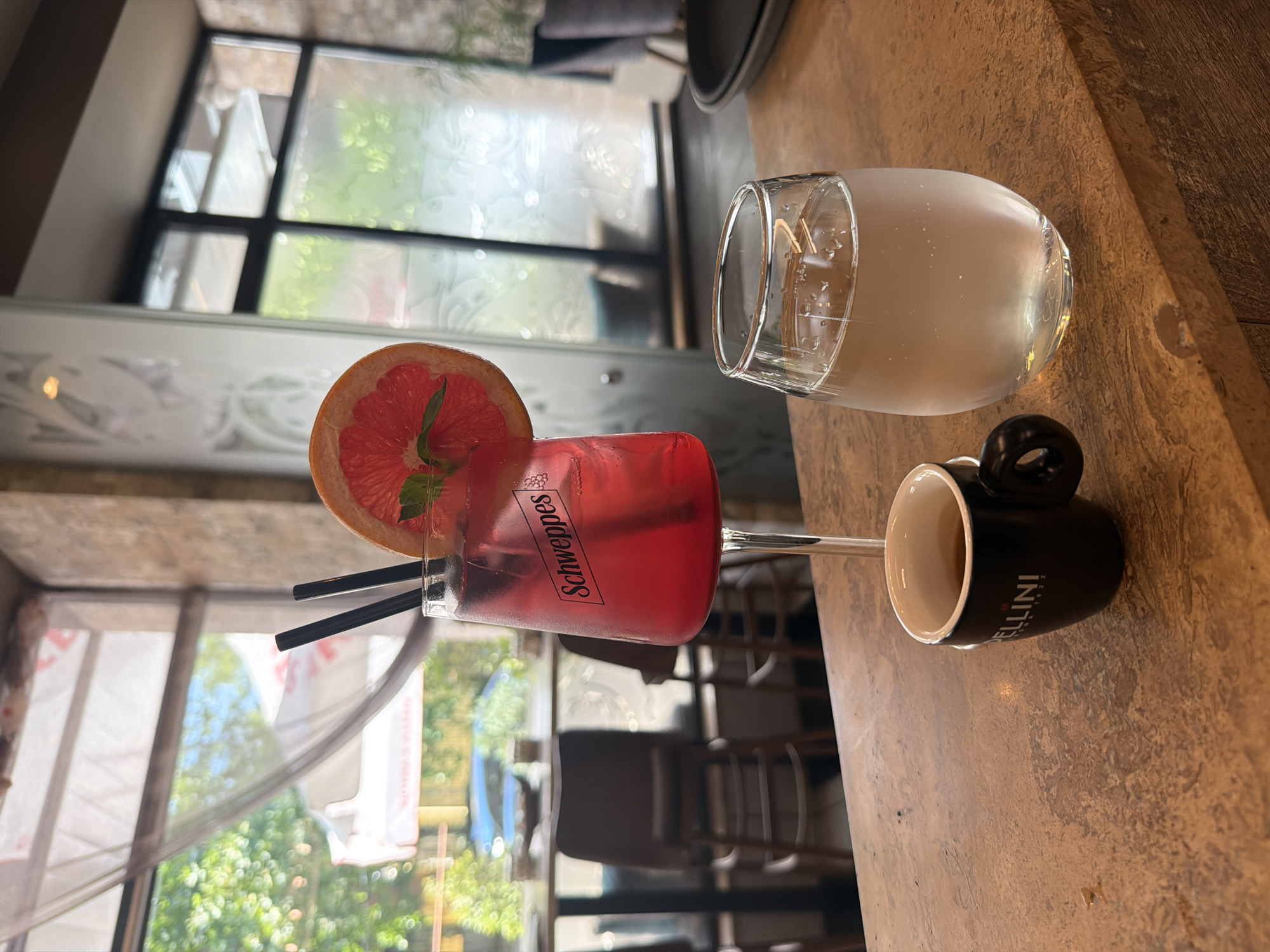 Drinks on a stone bar counter at a Bellini café