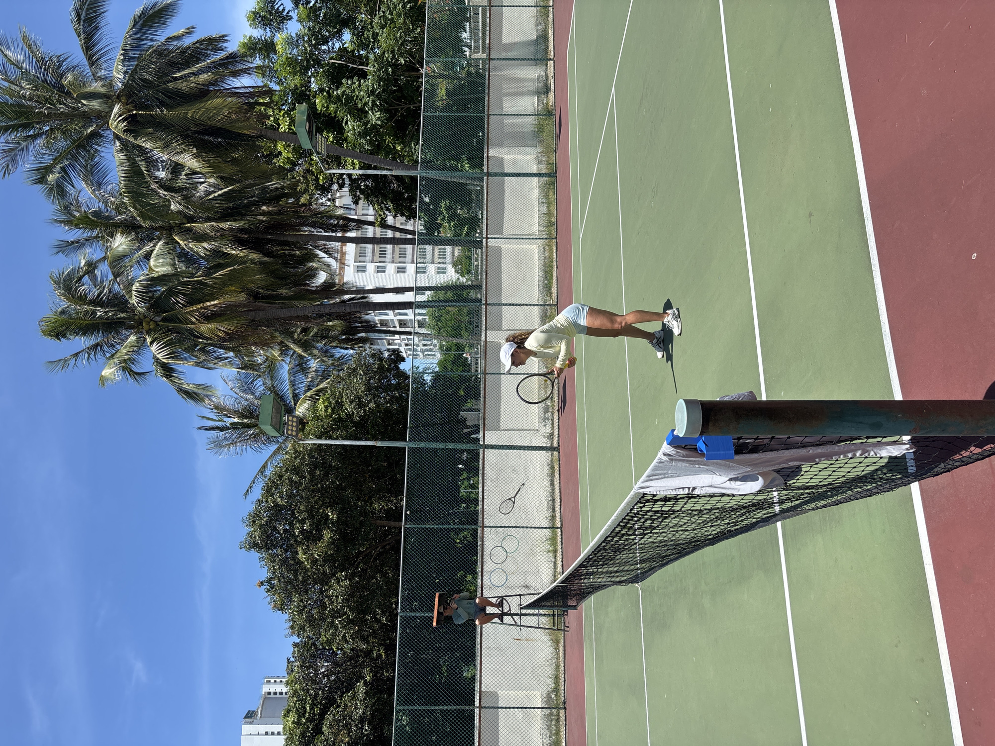 Morning tennis session at an outdoor court in Nha Trang