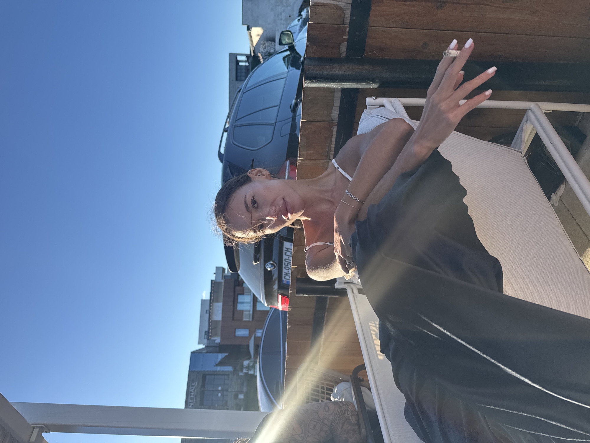 Relaxed outdoor social gathering at a hillside venue in Mukhatskaro