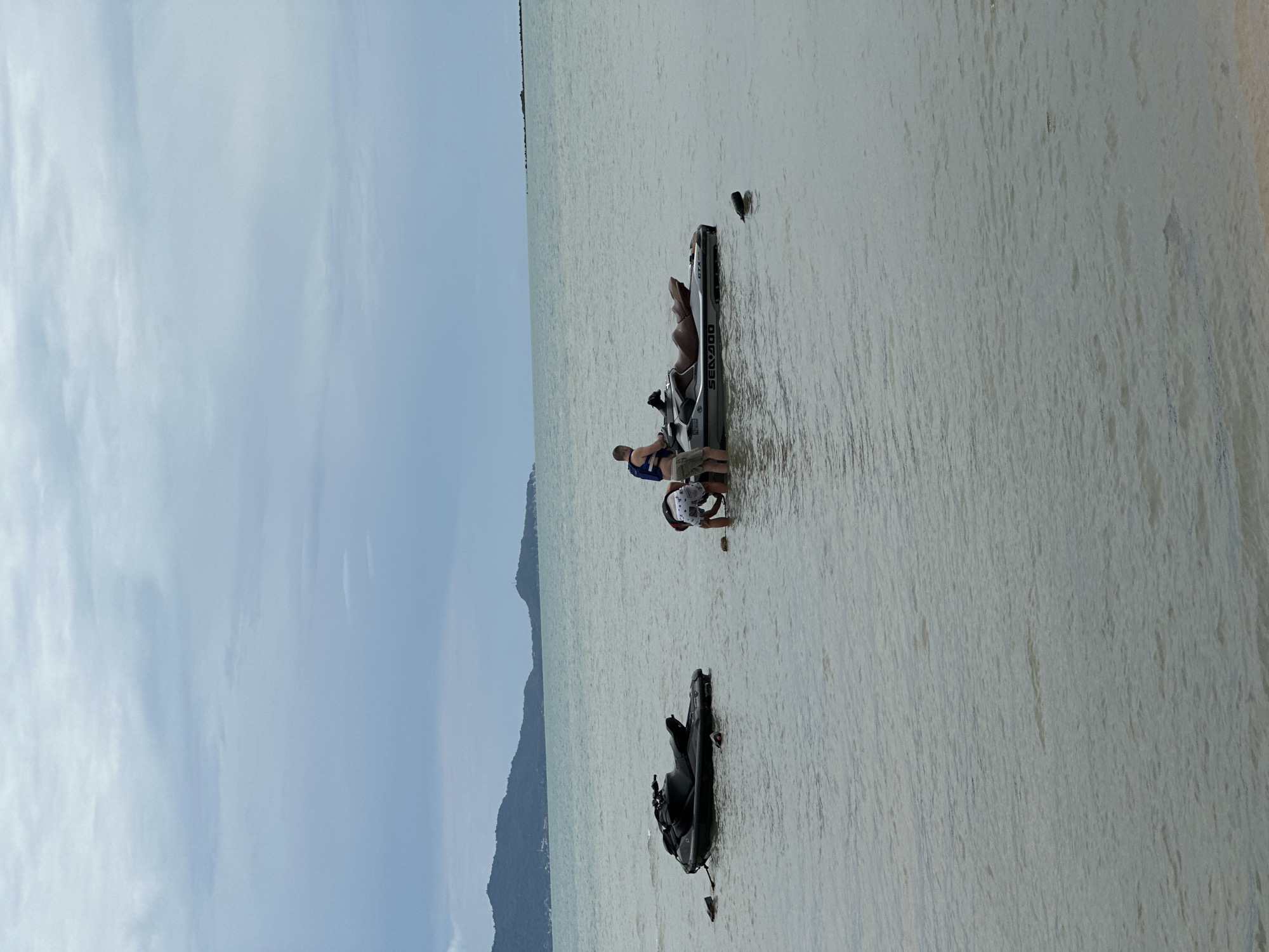 Jet skis and beach hut on a Ko Samui shoreline