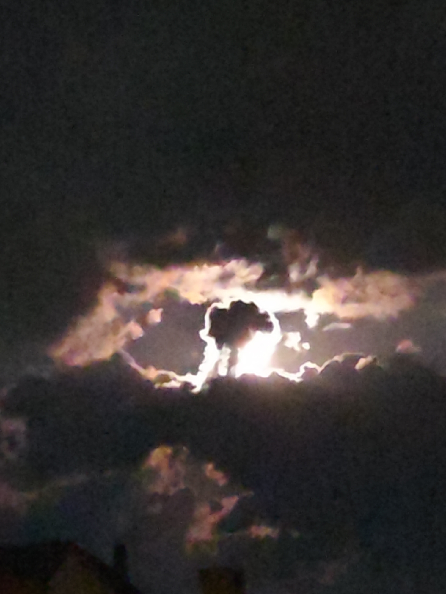 Full moon creates dramatic cloudy night display over Burgas