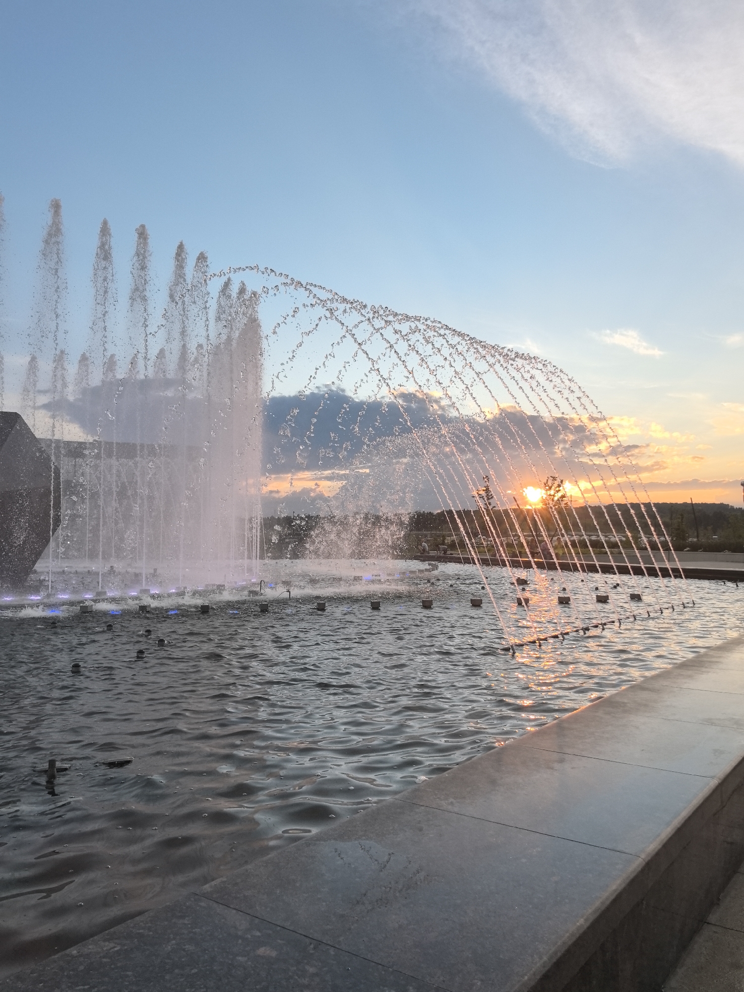 Magnitogorsk plaza fountain at golden hour