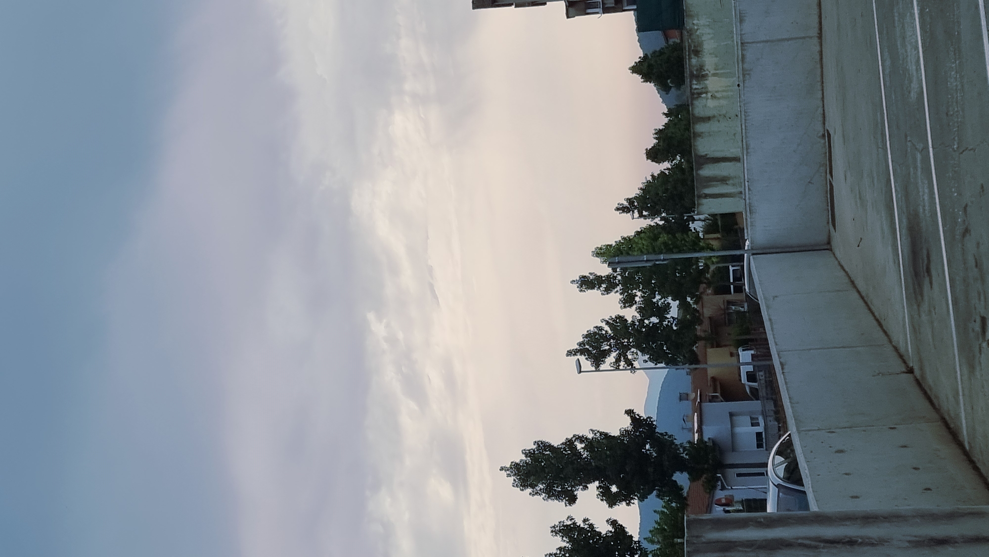 Street-level views of Sant Joan Les Fonts on a cloudy morning