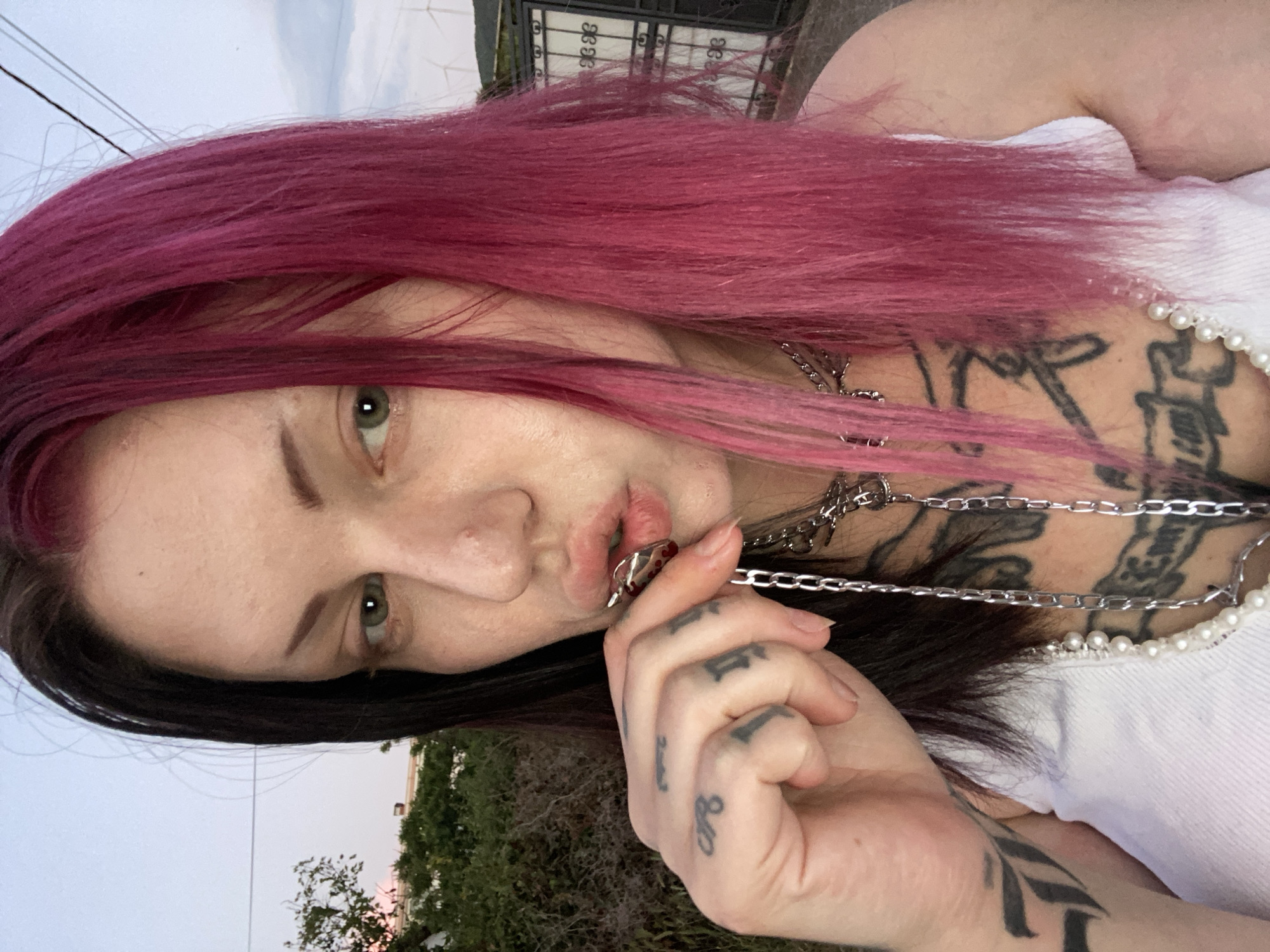 Woman takes street selfies in Kunje, Montenegro