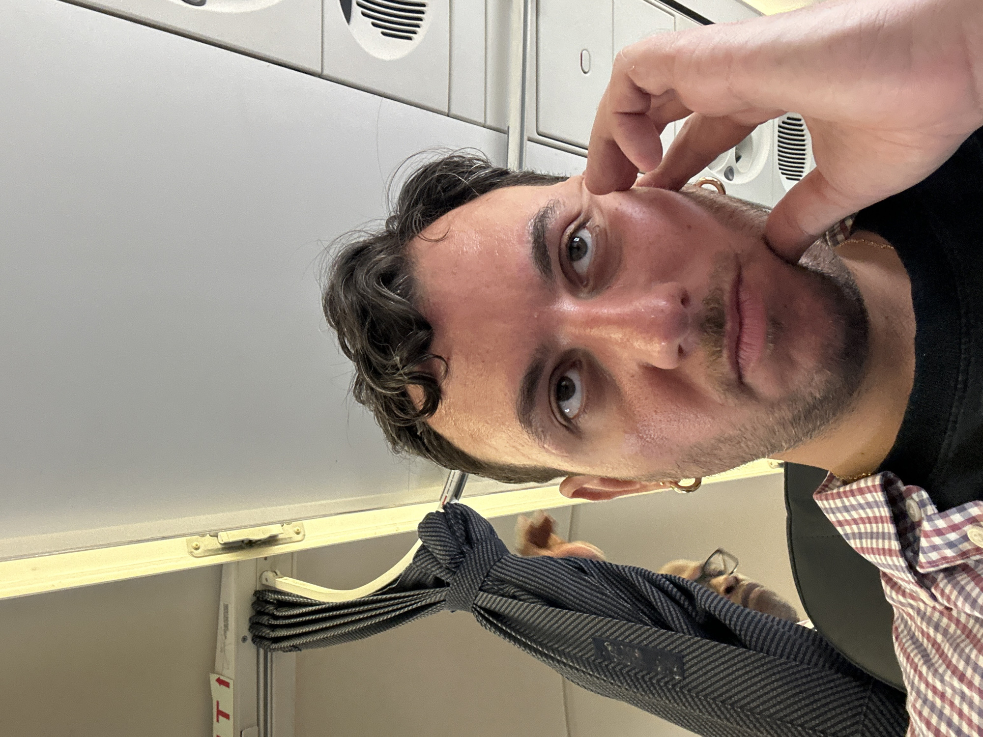 British Airways flight to Ibiza, snacks and a book in hand