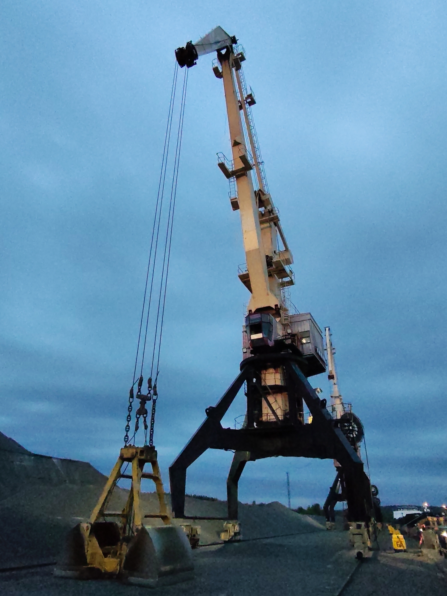 Evening cargo operations documented at Shalsky port facility