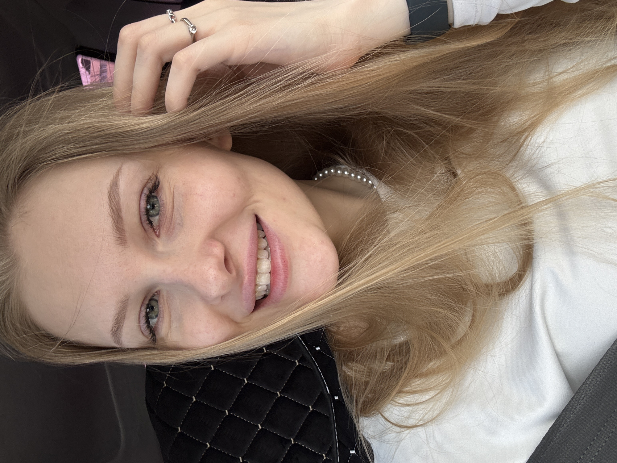 Morning car journey documented through selfies and street scenes in Perm