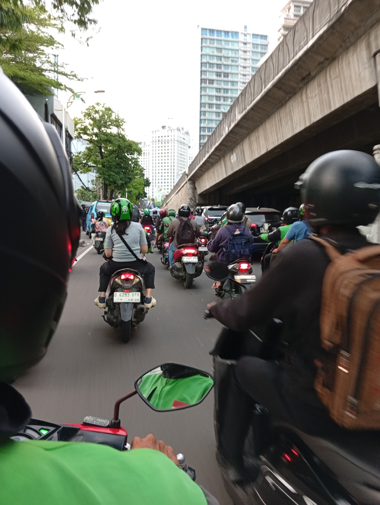 Rush hour traffic captured from motorcycle in Central Jakarta