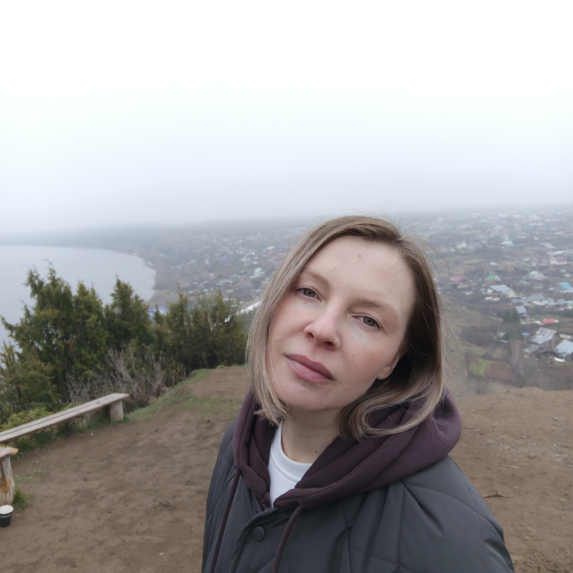 Dense morning fog blankets Ольховка village, Russia