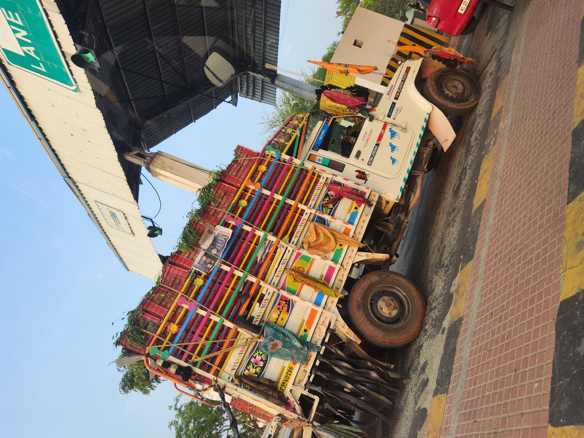 Decorated pickup truck loaded with red crates spotted in Narepalli