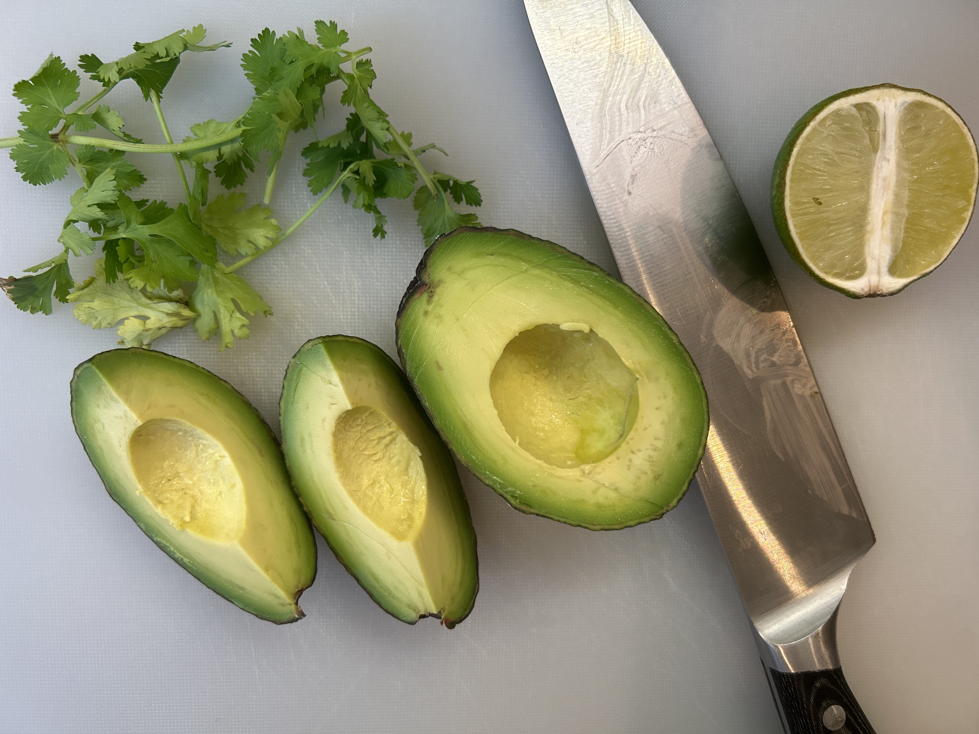 Avocado preparation captured in Manchester kitchen Thursday evening