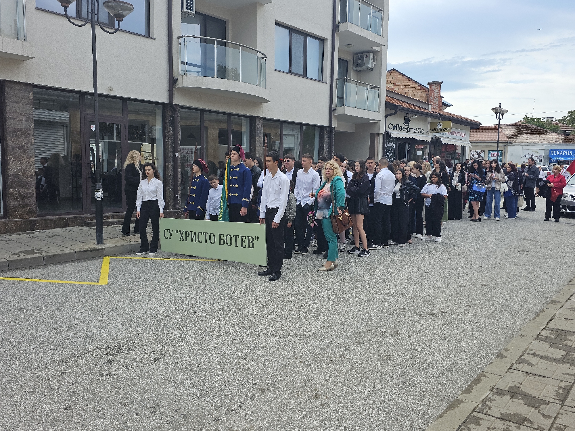 Students march through Karnobat streets in formal procession