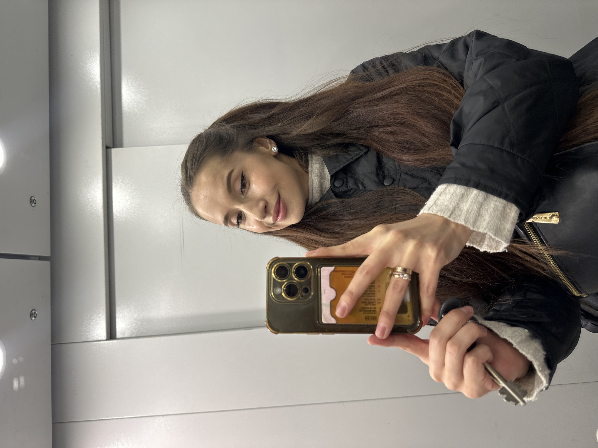Woman photographed across multiple Yekaterinburg locations during afternoon