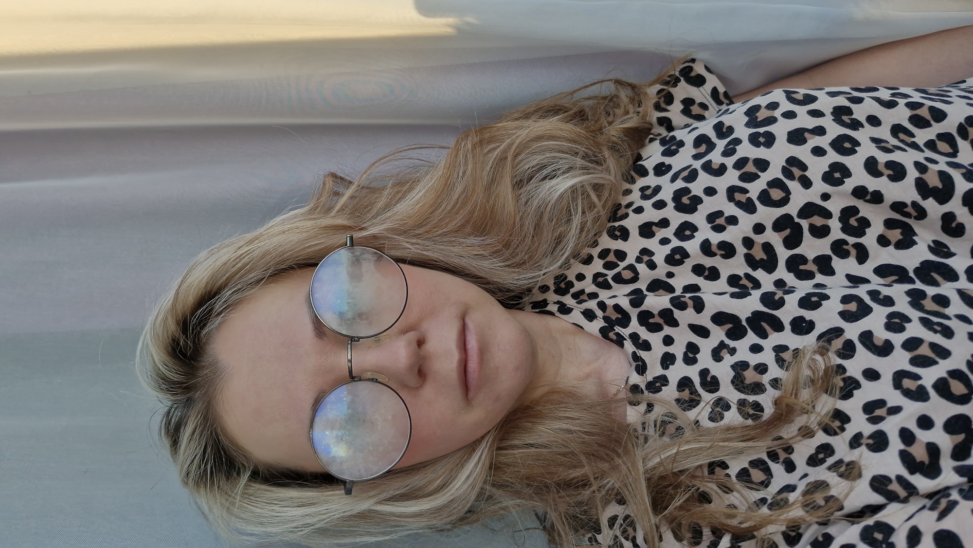 Person in leopard print rests at undisclosed location