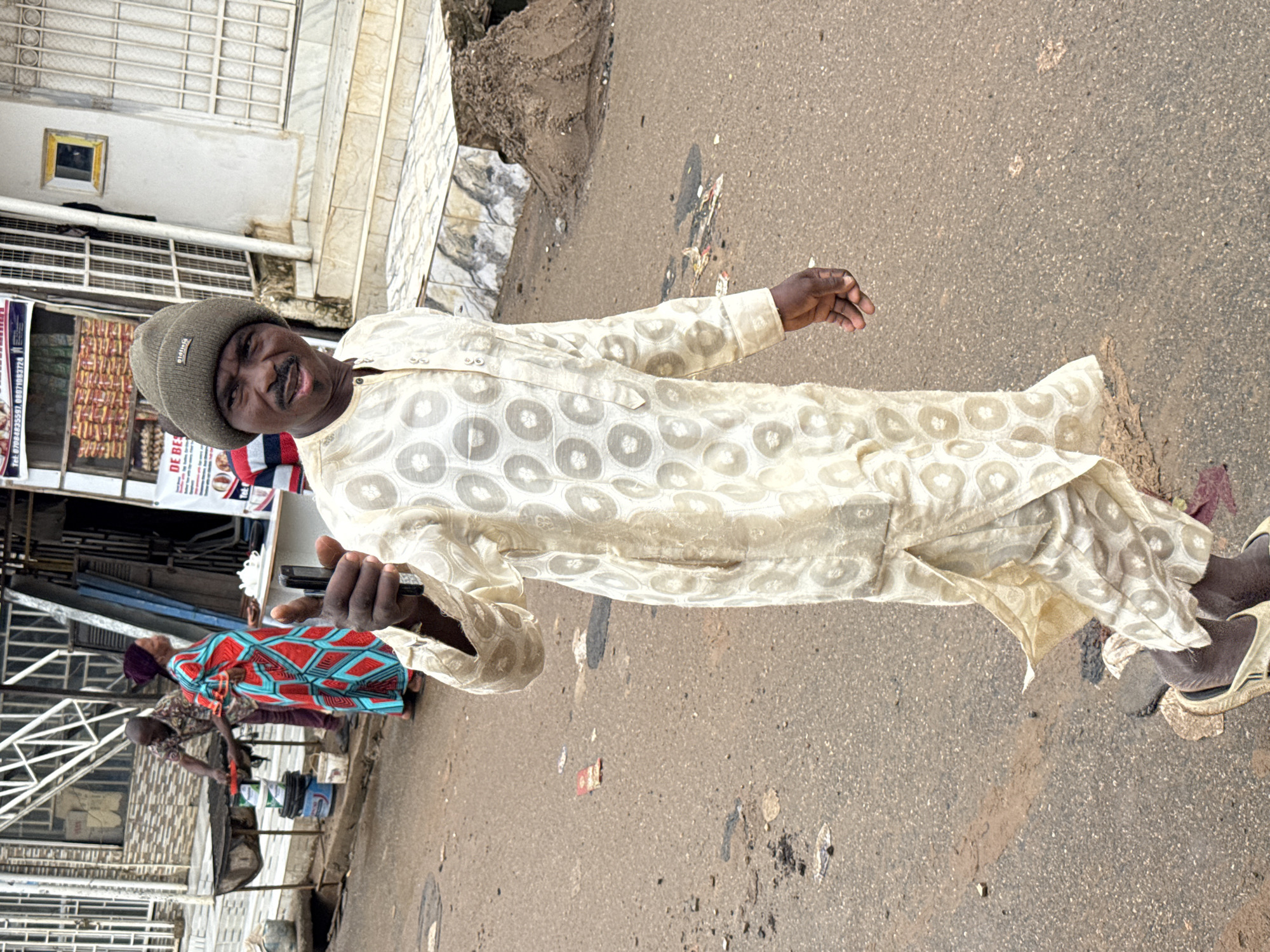 Morning street life in a busy Abuja market district