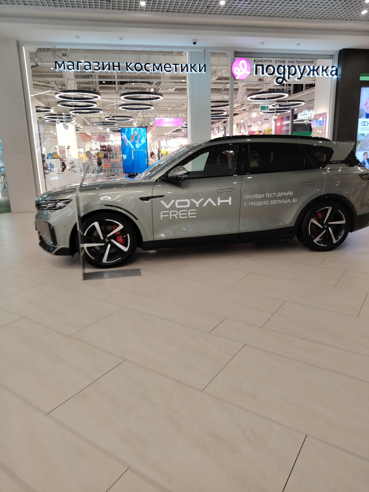Retail browsing and street scenes around Hrodna's Triniti mall