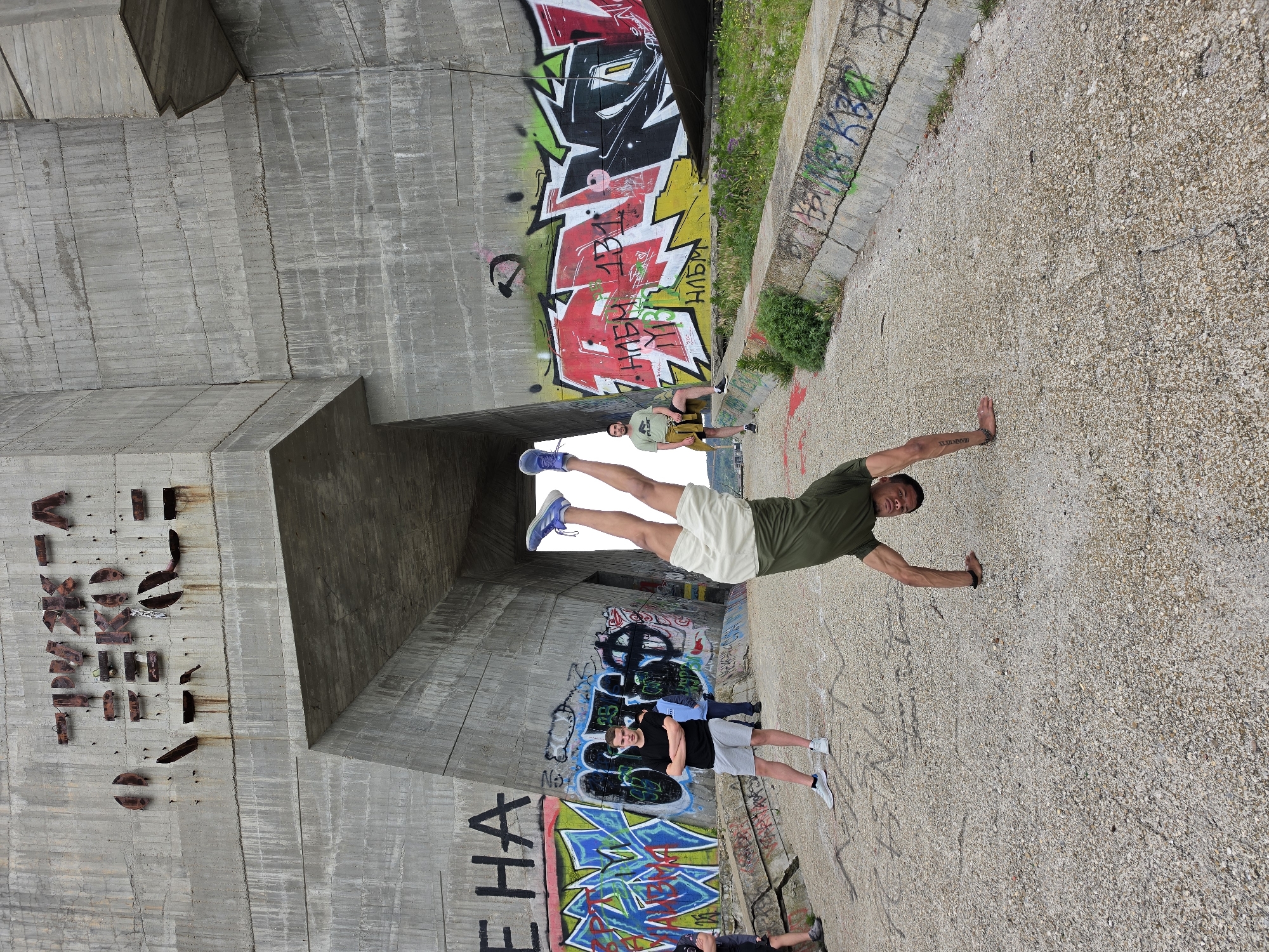 Young visitors perform parkour at Communist monument in Varna