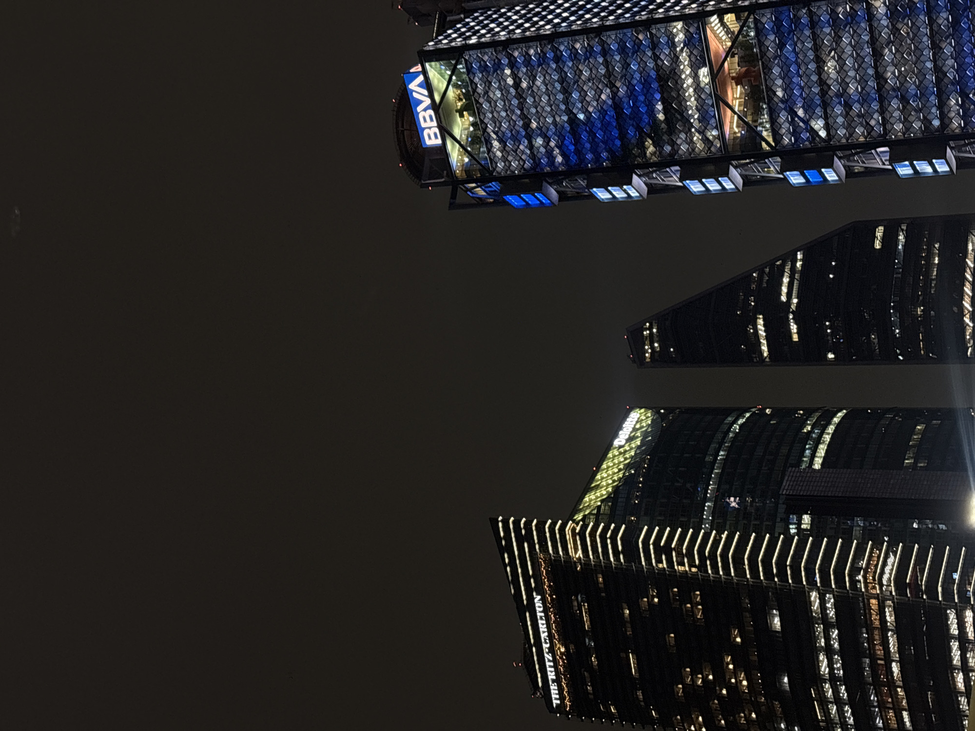 Mexico City skyscrapers illuminated in nighttime photography session
