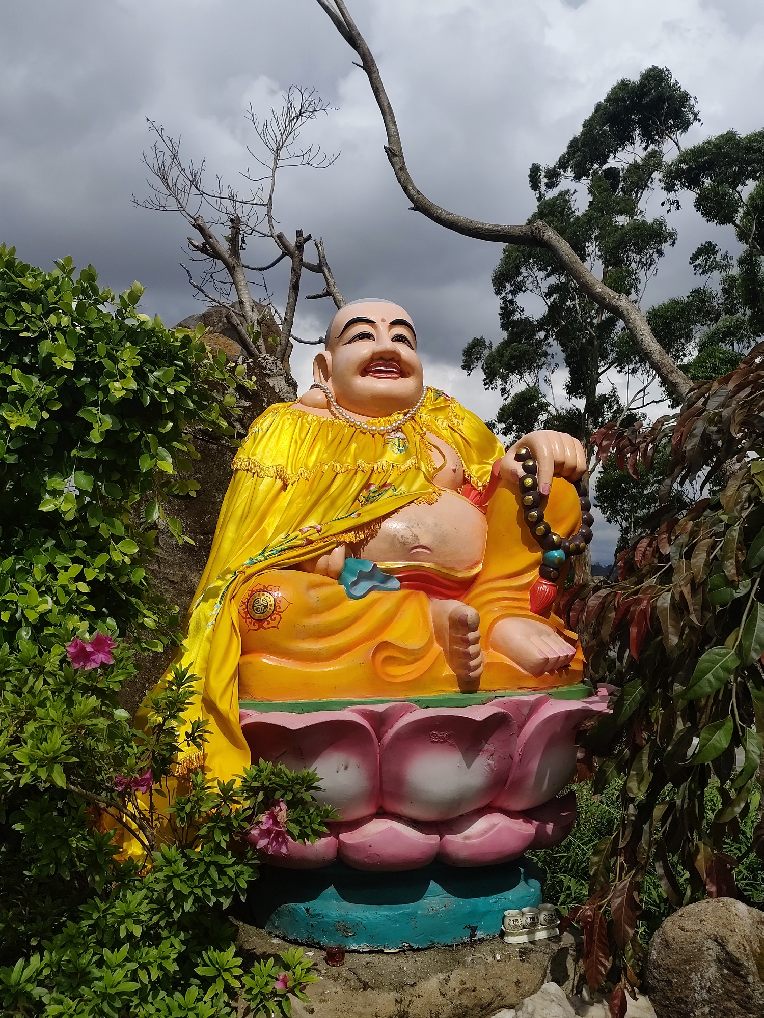 Golden Buddha statue documented in Da Lat, Vietnam