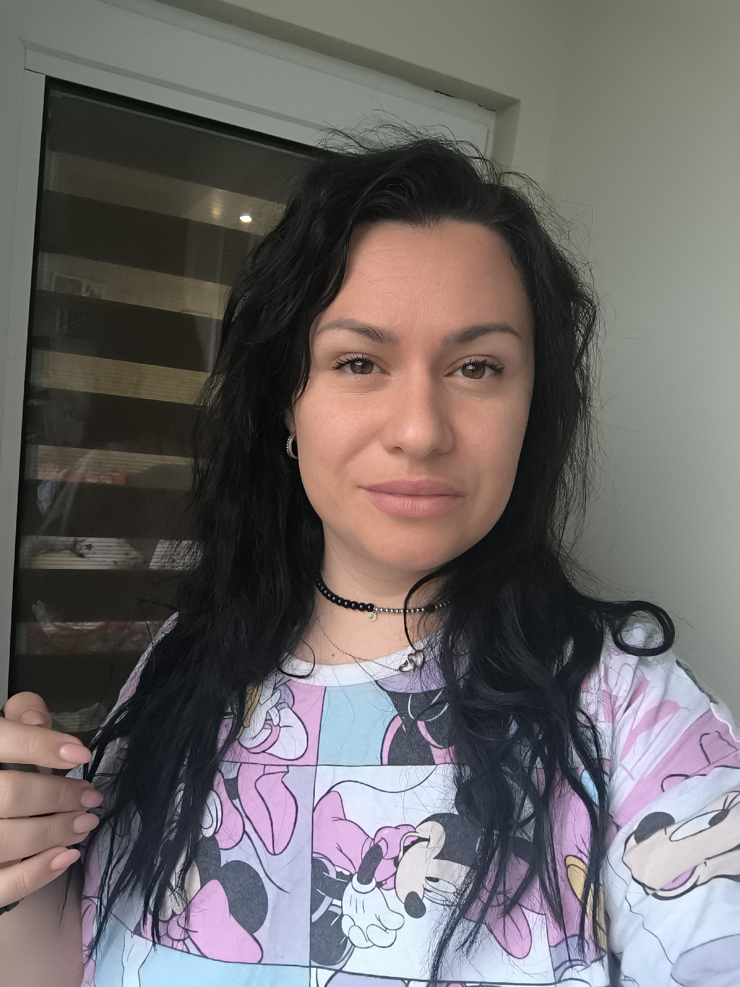 Woman takes morning selfie at home in Pleven, Bulgaria