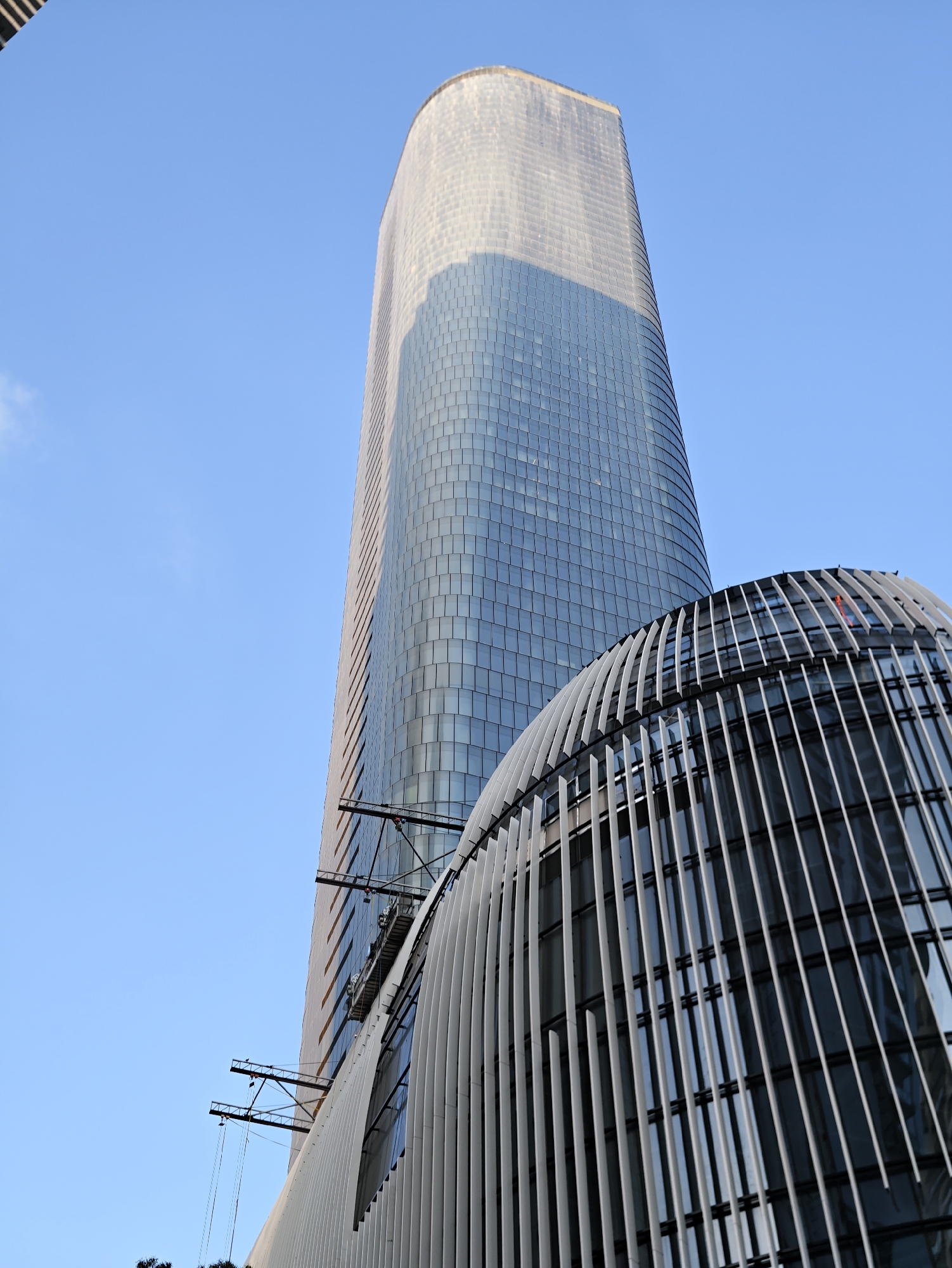 Low-angle views of Tel Aviv and Givatayim's glass tower skyline