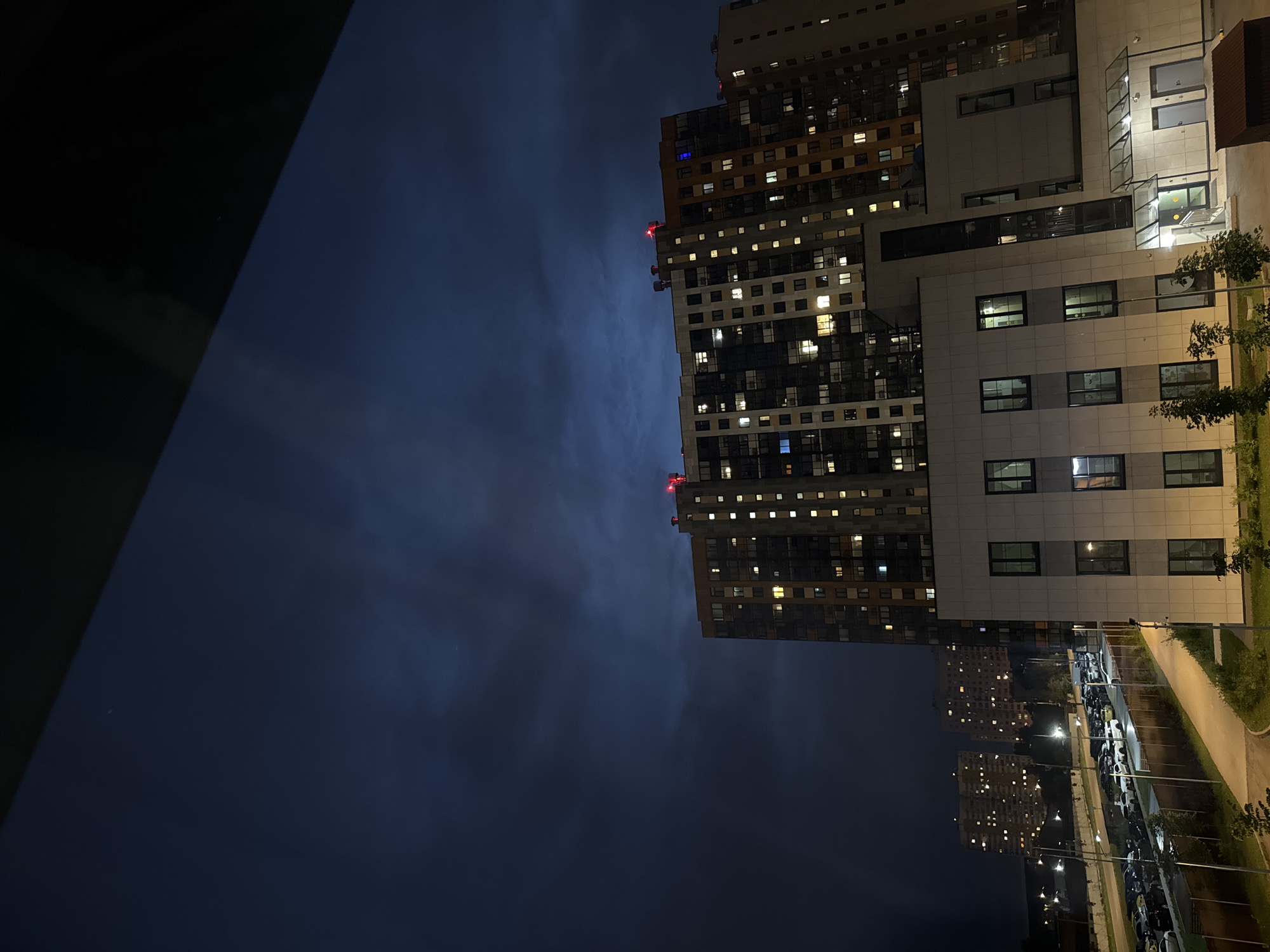 Quiet evening in Vatutinki: apartment towers and late-night TV
