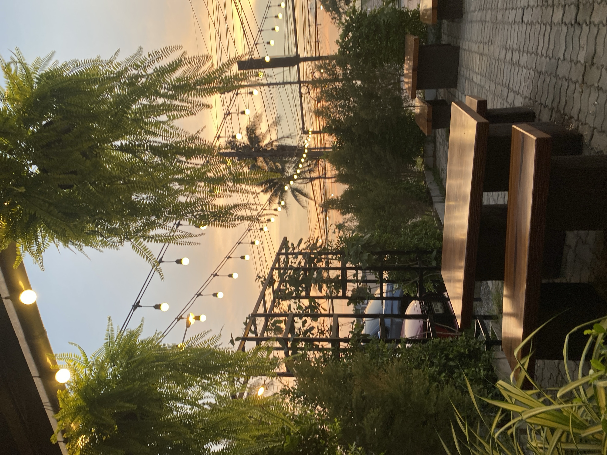Evening dining captured at outdoor restaurant in Choeng Thale