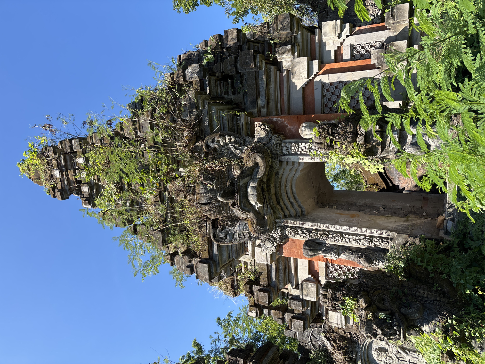 Witness documents abandoned temple complex with graffiti in Denpasar