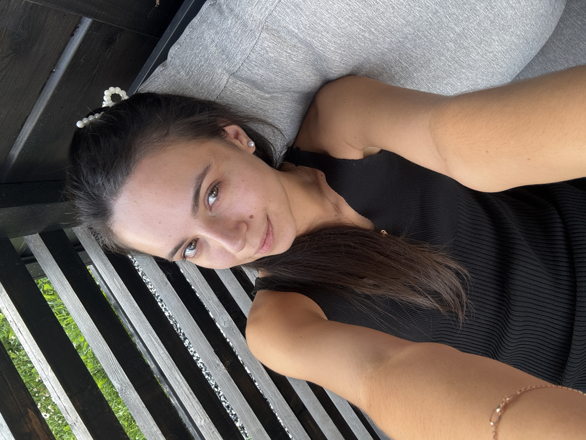 Outdoor drinks and grilled skewers on a balcony
