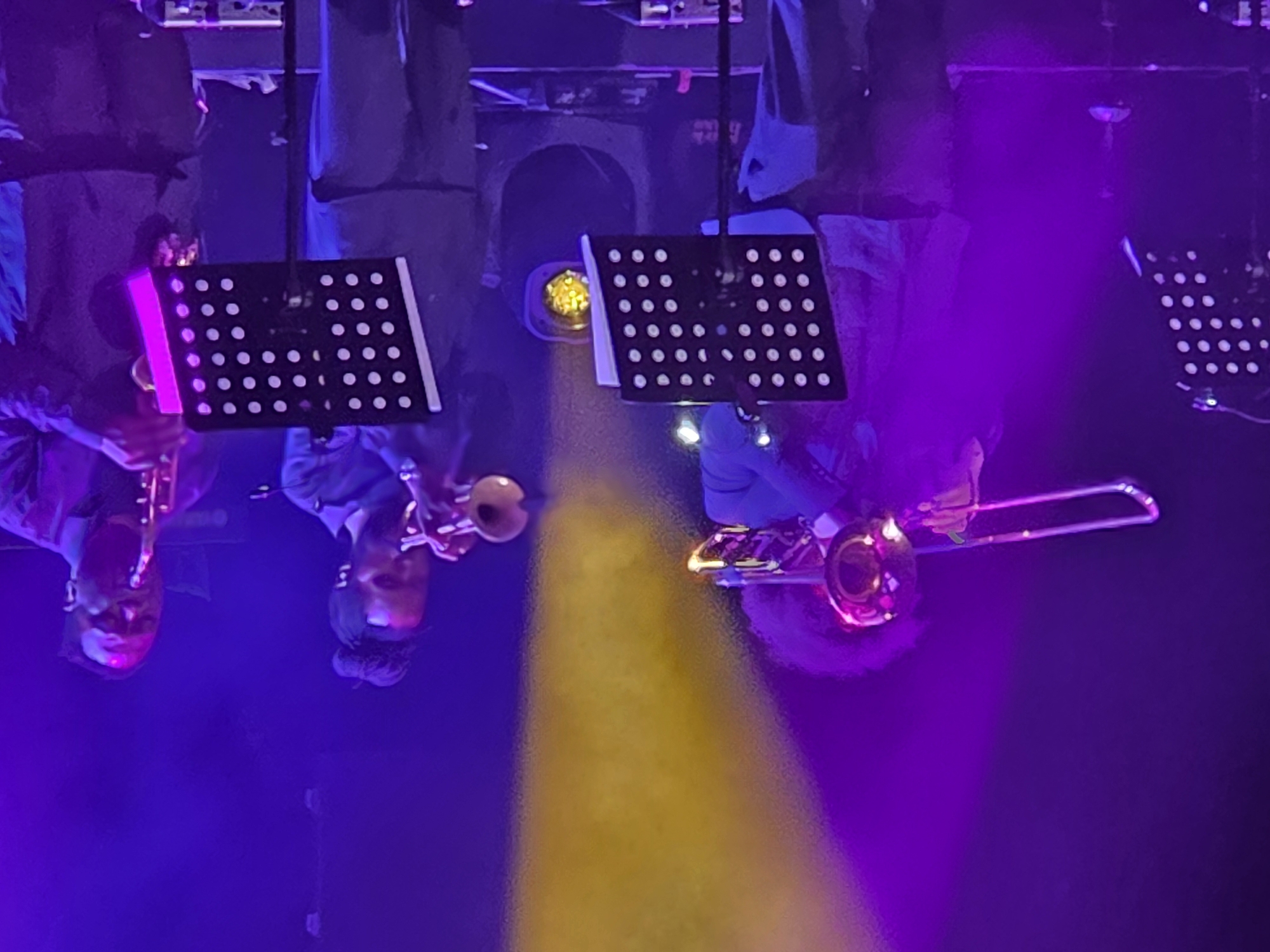 Live band performs in Johannesburg with colorful stage lighting
